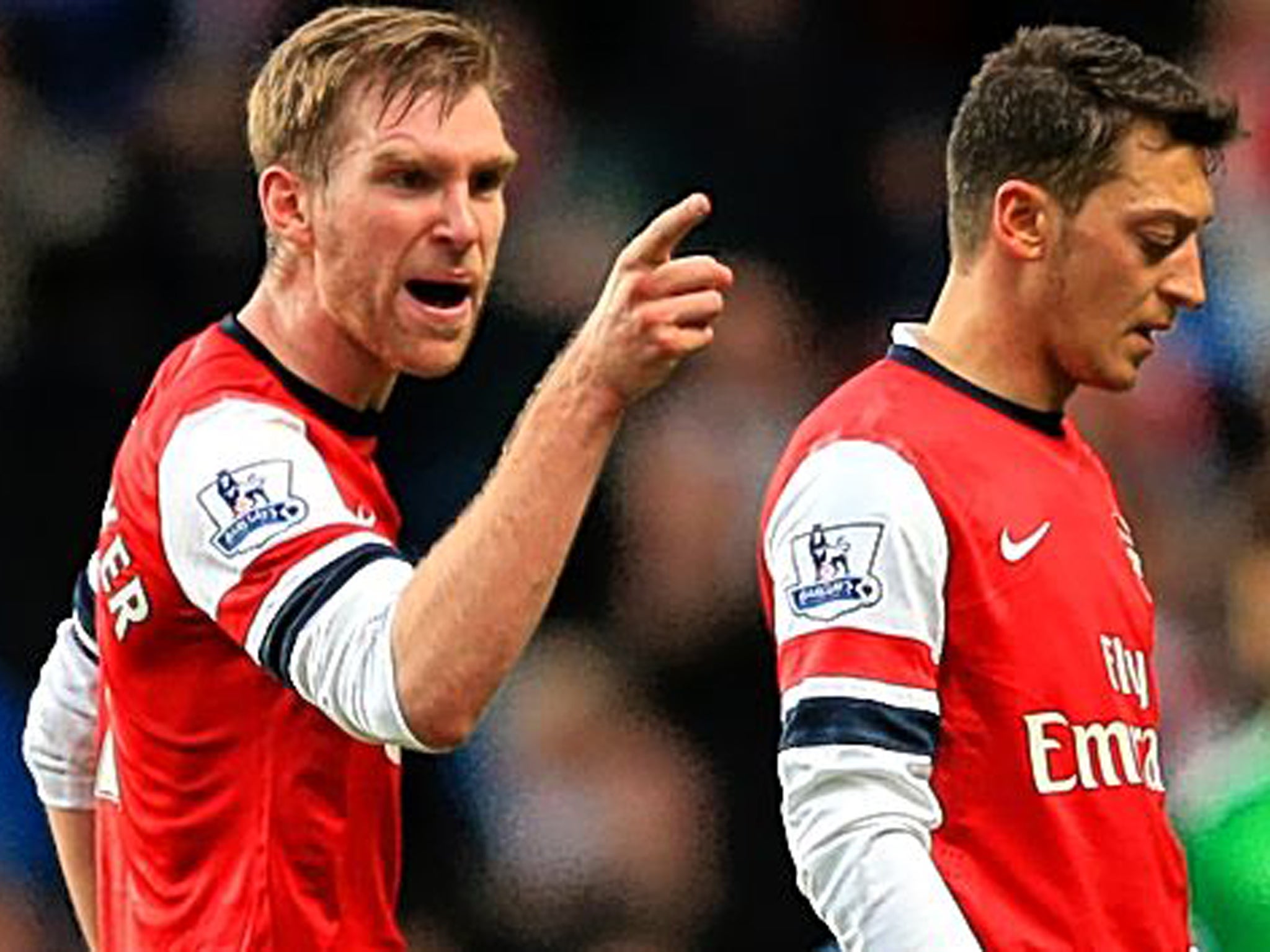 Per Mertesacker made his feelings clear with Mesut Ozil