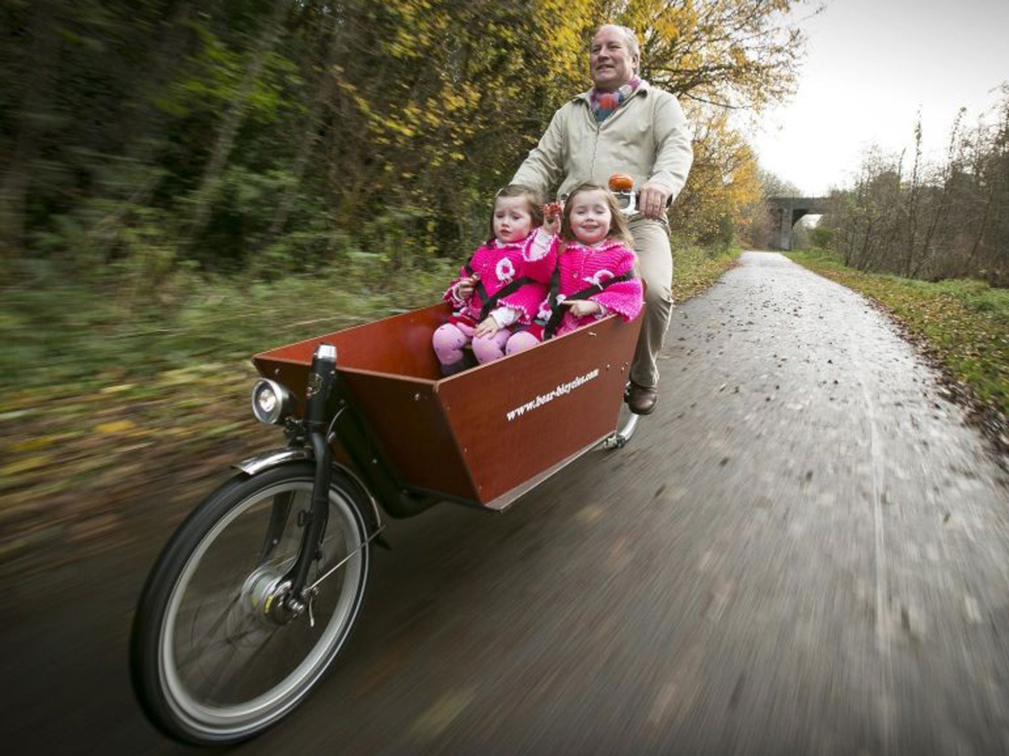 Going Dutch: Steven Patterson regularly takes his three-year-old twin daughter Lilly and Grace for spins on his cargo bike