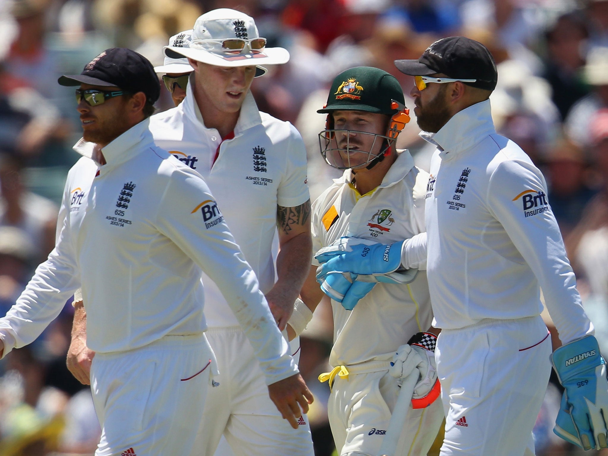 Matt Prior (far right) engages in a war of words with Australian batsman David Warner (second from right)