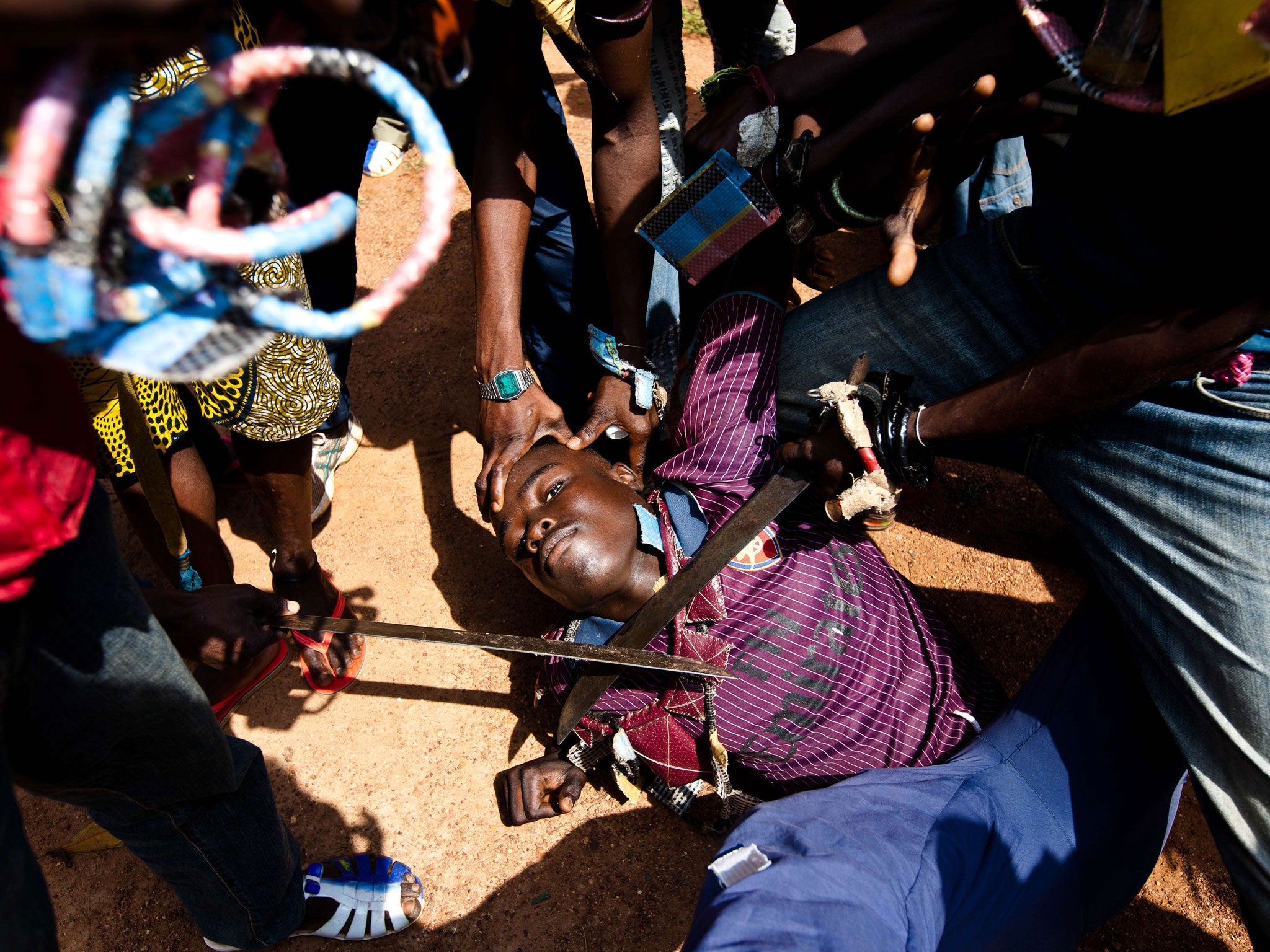 A group of Christian vigilantes in the capital Bangui act out what they would do if they caught members of the Seleka Muslim militia