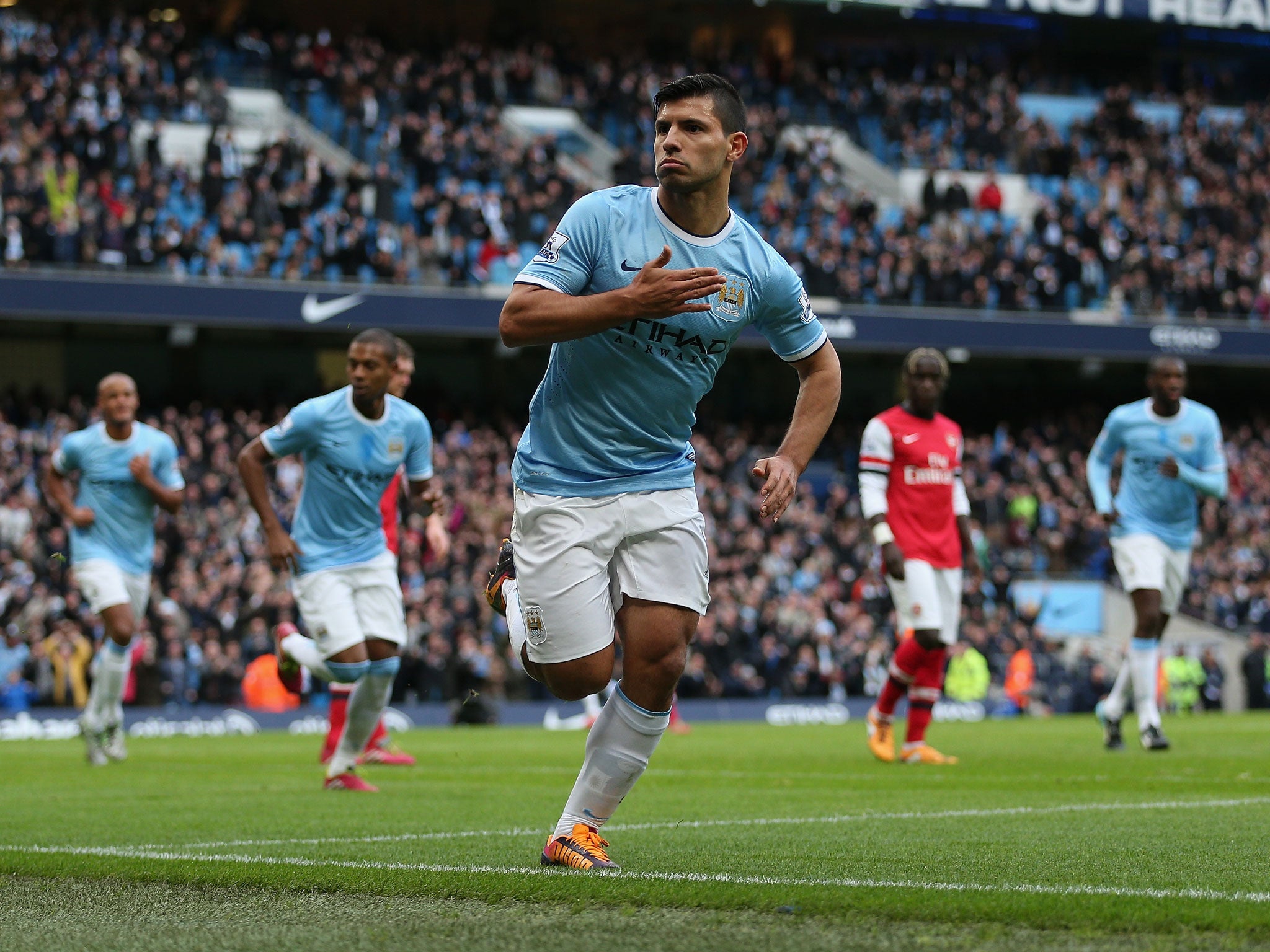 Sergio Aguero scores against Arsenal