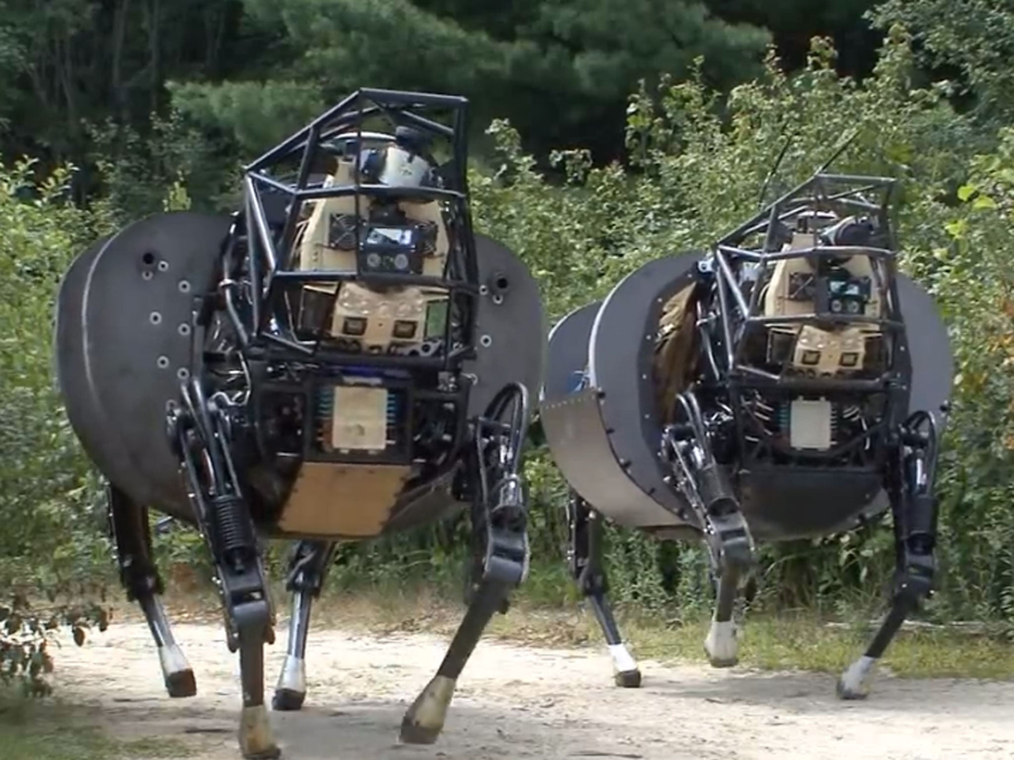 Two quadrupedal robots built by Boston Dynamics to assist infantry by carrying equipment