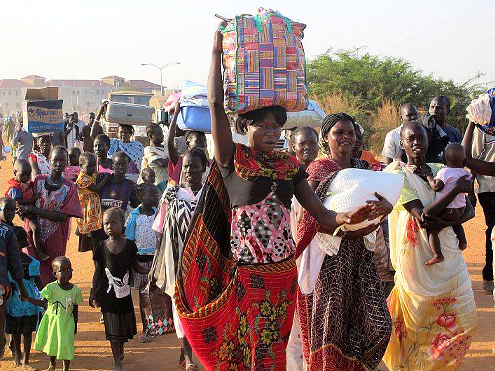 Civilians fleeing from the violence in Juba take refuge at a United Nations compound near the city’s international airport. Parts of the capital are said to be in ruins