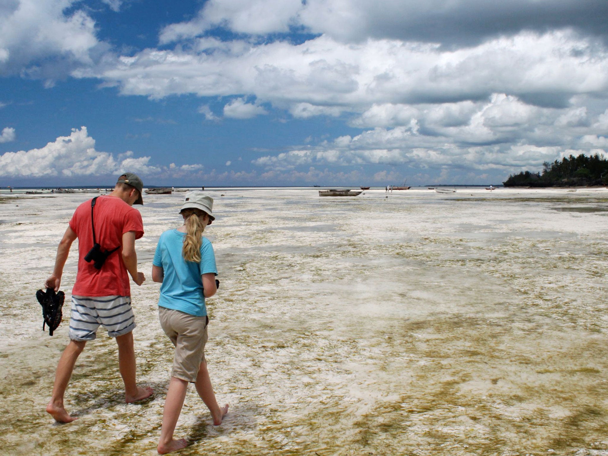 White sand Christmas: the writer's daughter and nephew on the beach in Zanzibar