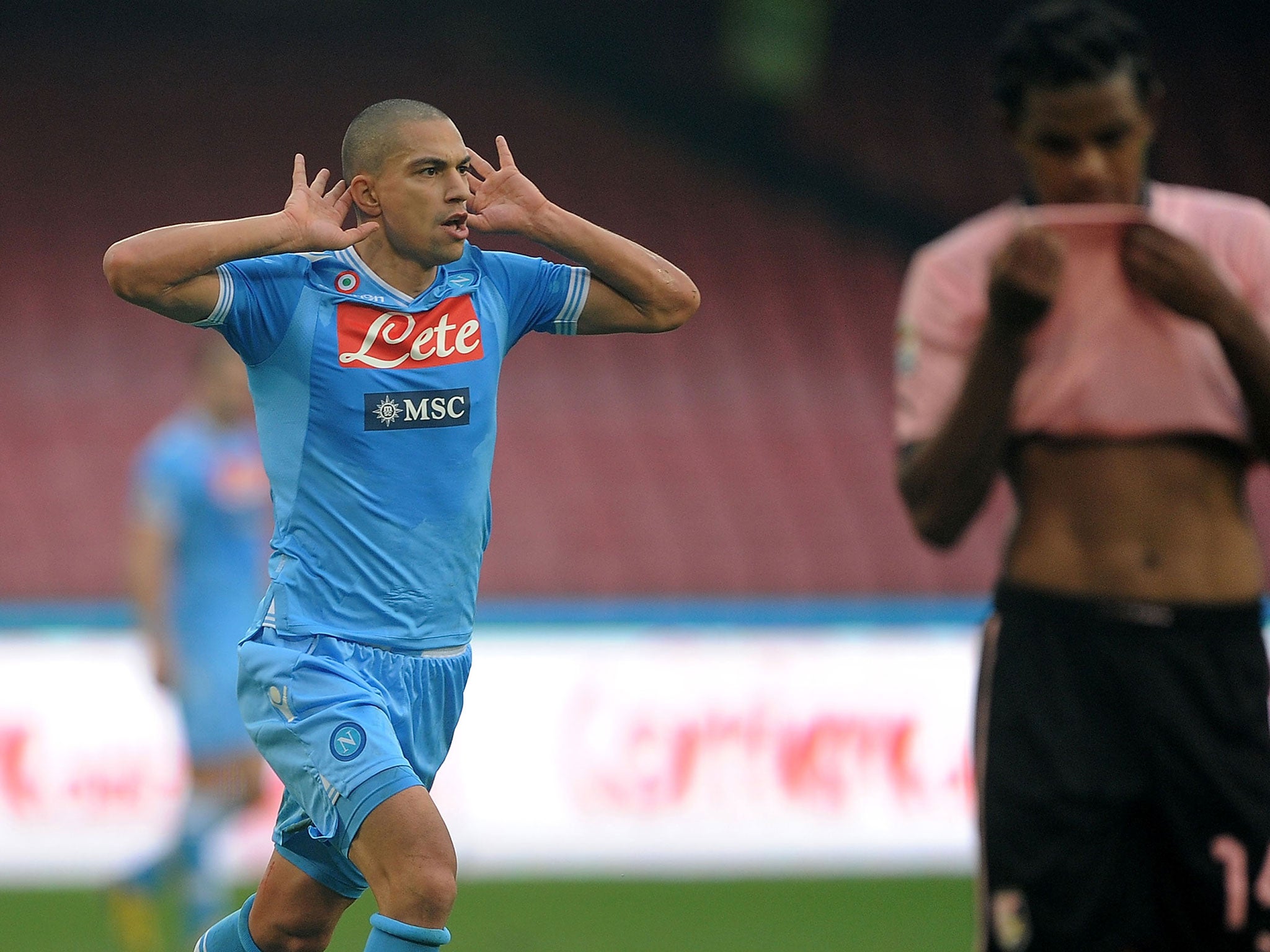 Gokhan Inler of Napoli celebrates scoring