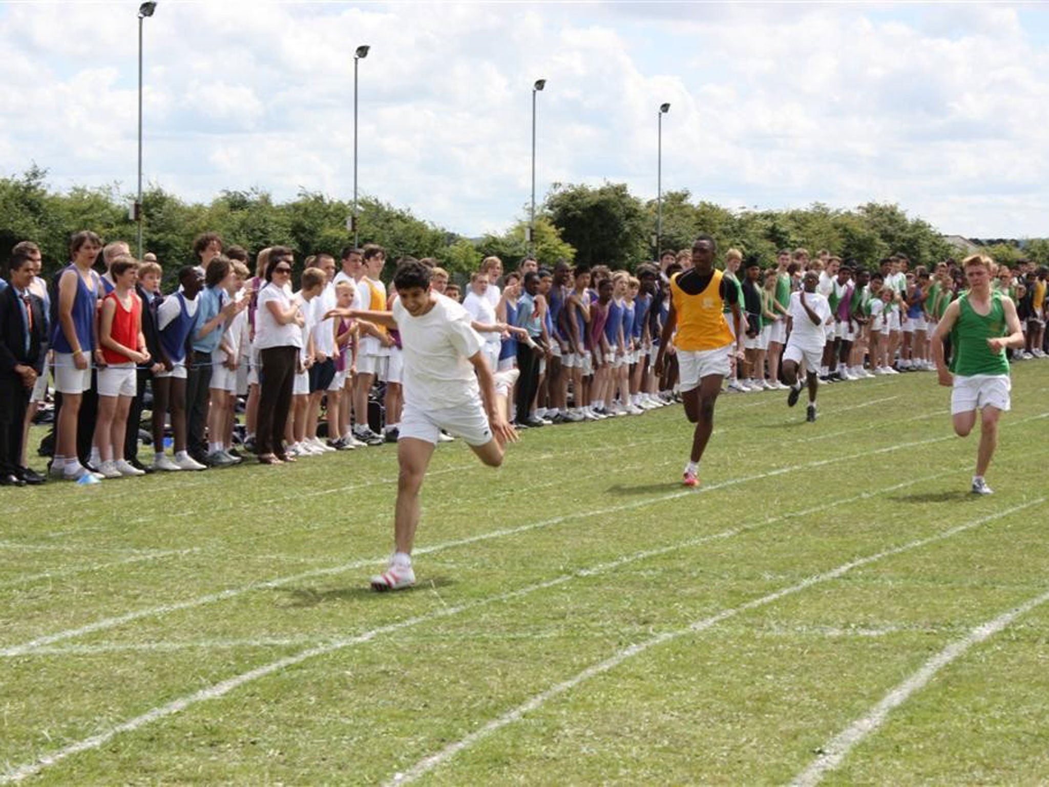 Gemili wins the 100m at a school sports day in Dartford in 2009