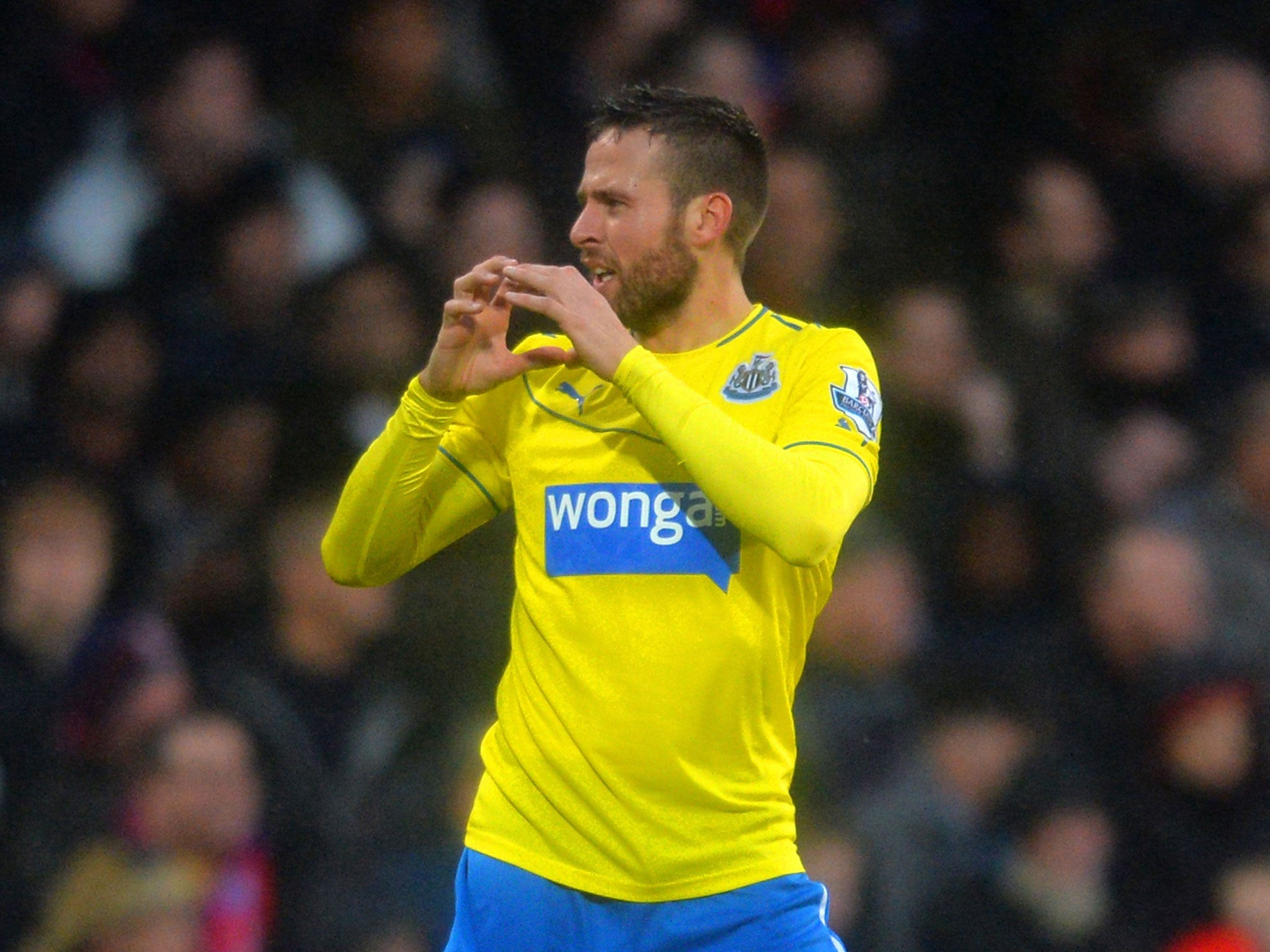 Yohan Cabaye of Newcastle United celebrates scoring the first goal