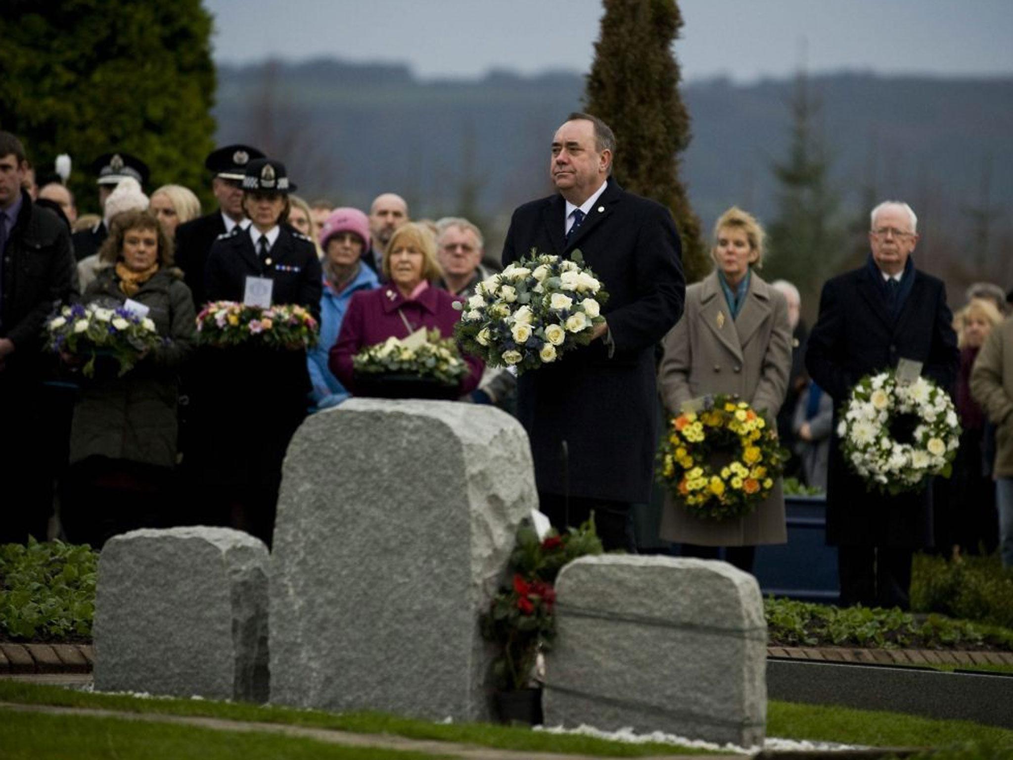 Scotland’s First Minister, Alex Salmond, lays a wreath at Dryfesdale Cemetery, near Lockerbie in 2013