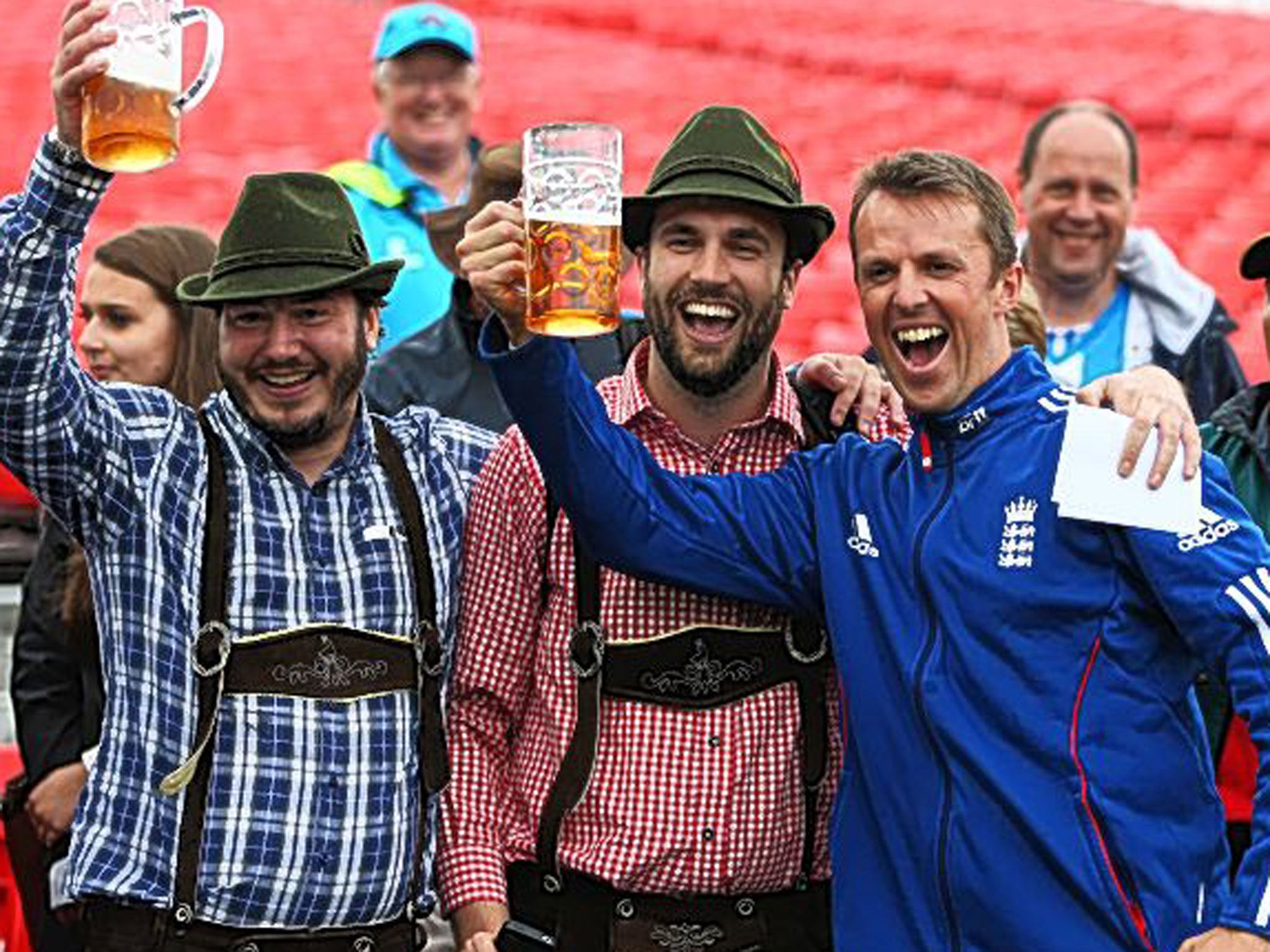 Graeme Swann poses with fans after England retained the Ashes at Old Trafford this summer