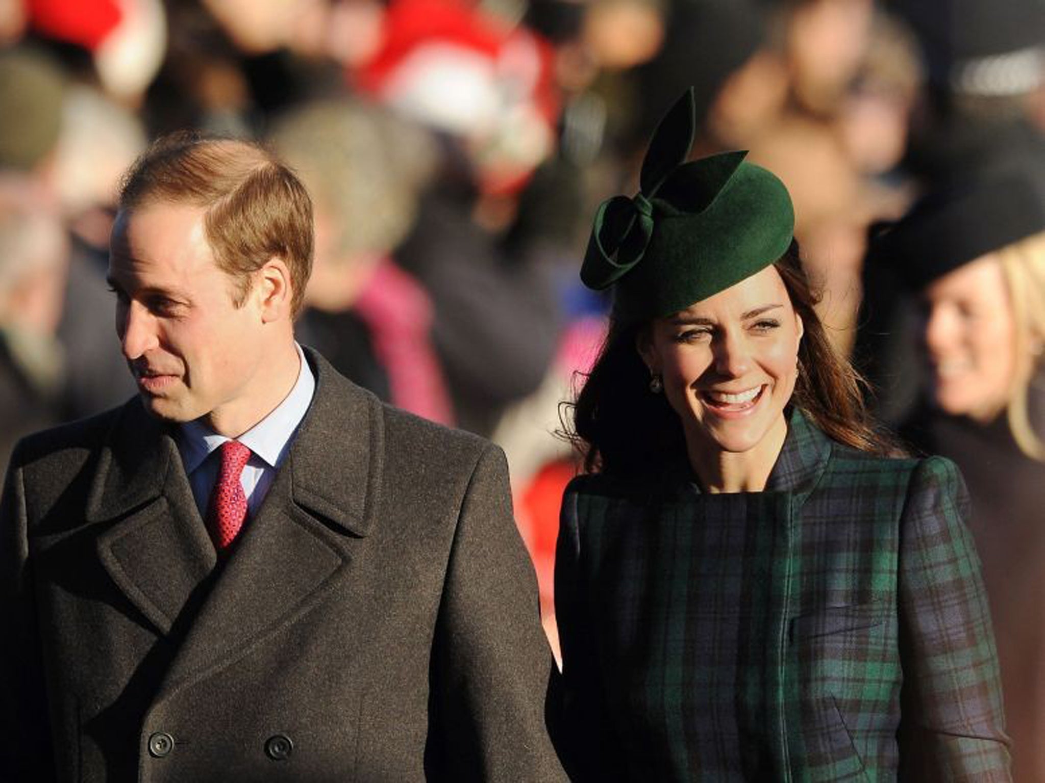 The Duke and Duchess of Cambridge make their way to St Mary Magdalene Church. But there was no sign of Prince George as temperatures stayed just above freezing