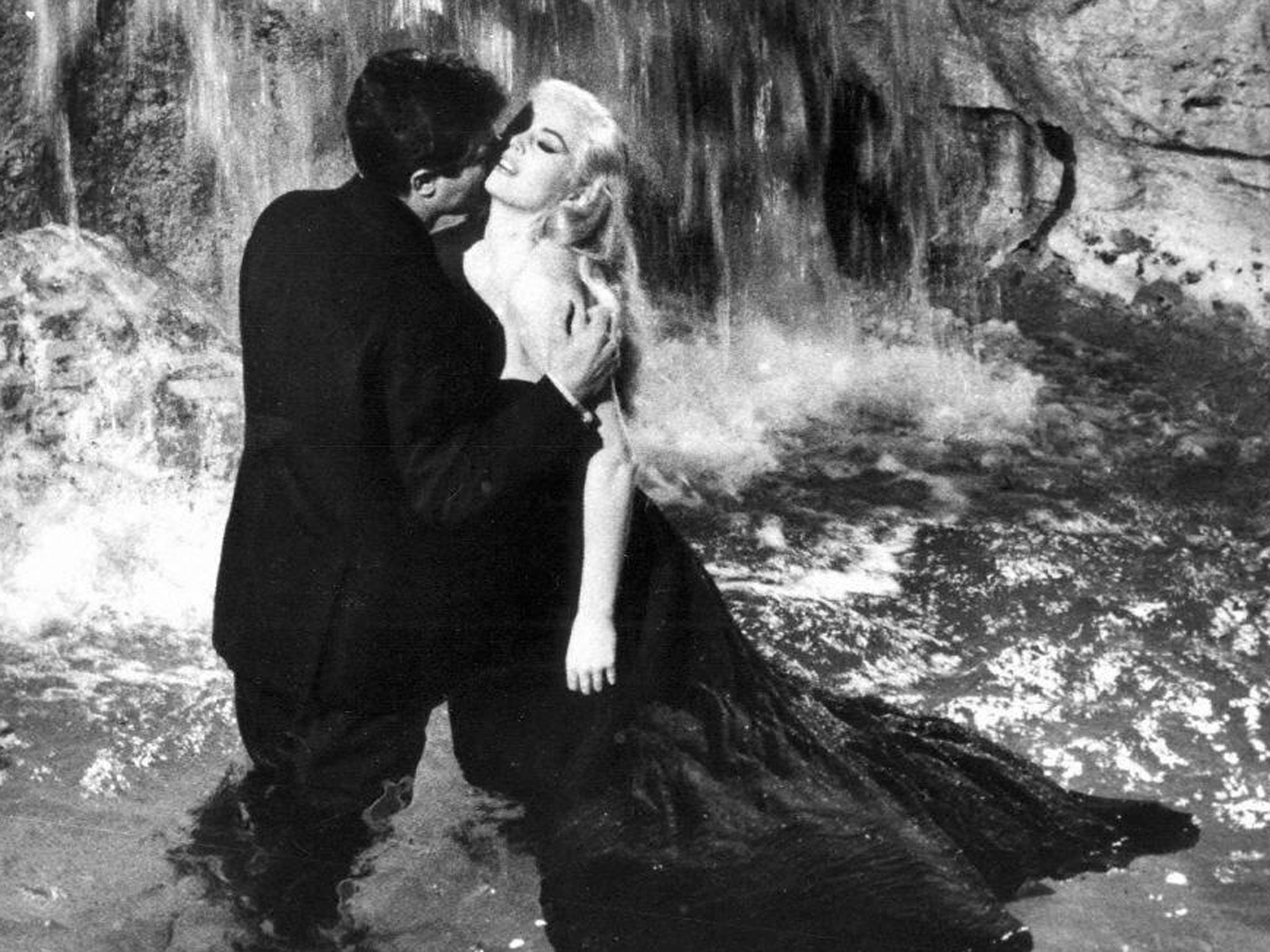 Marcello Mastroianni and Anita Ekberg in Rome's famous 'Fontana di Trevi' during the filming of Federico Fellin's 'La Dolce Vita' (AFP/Getty)