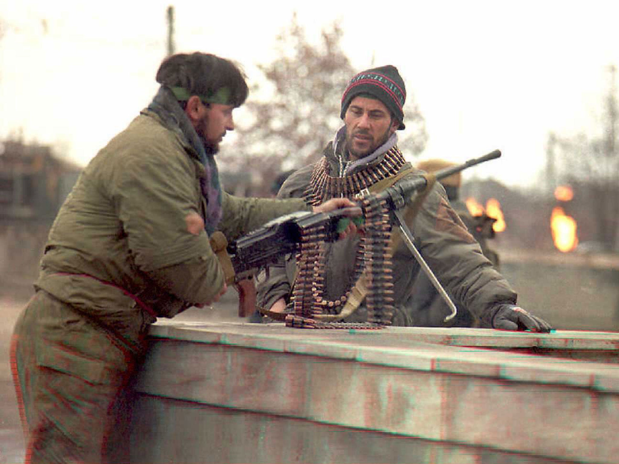 Chechen fighters position a machine gun during a pause in fighting in downtown Grozny in 1994.