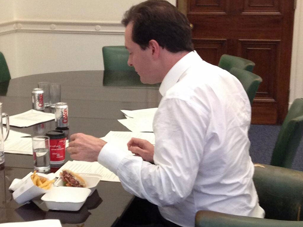 Osborne tucks into burger and chips