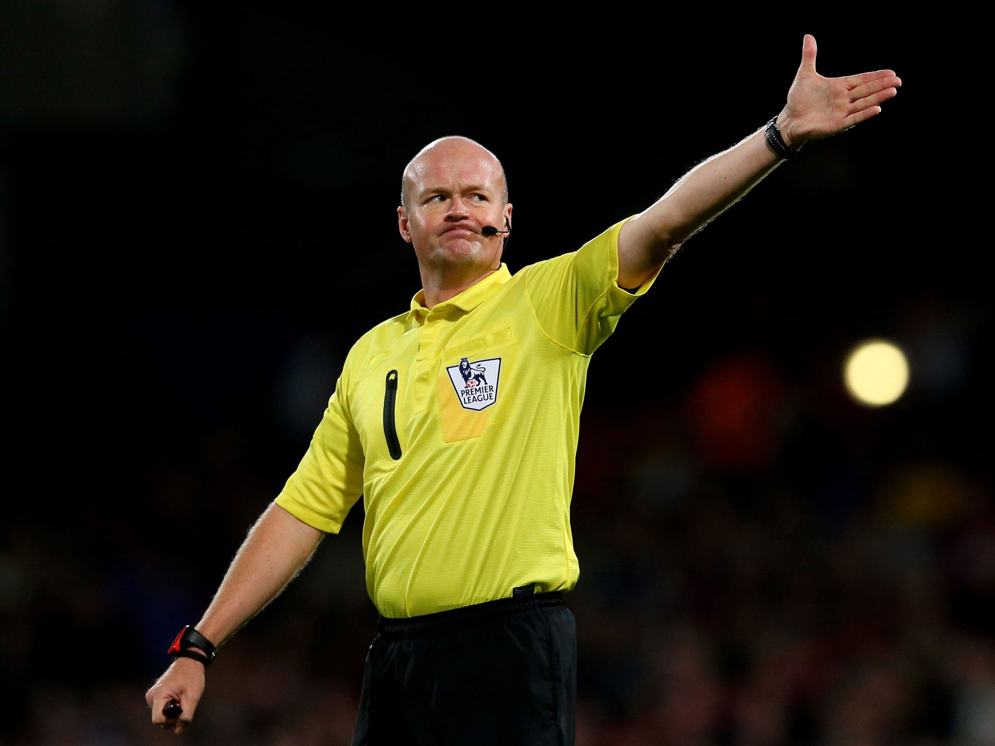 The FA has asked Brendan Rodgers to explain his comments about referee Lee Mason, pictured, on Boxing Day (Getty)