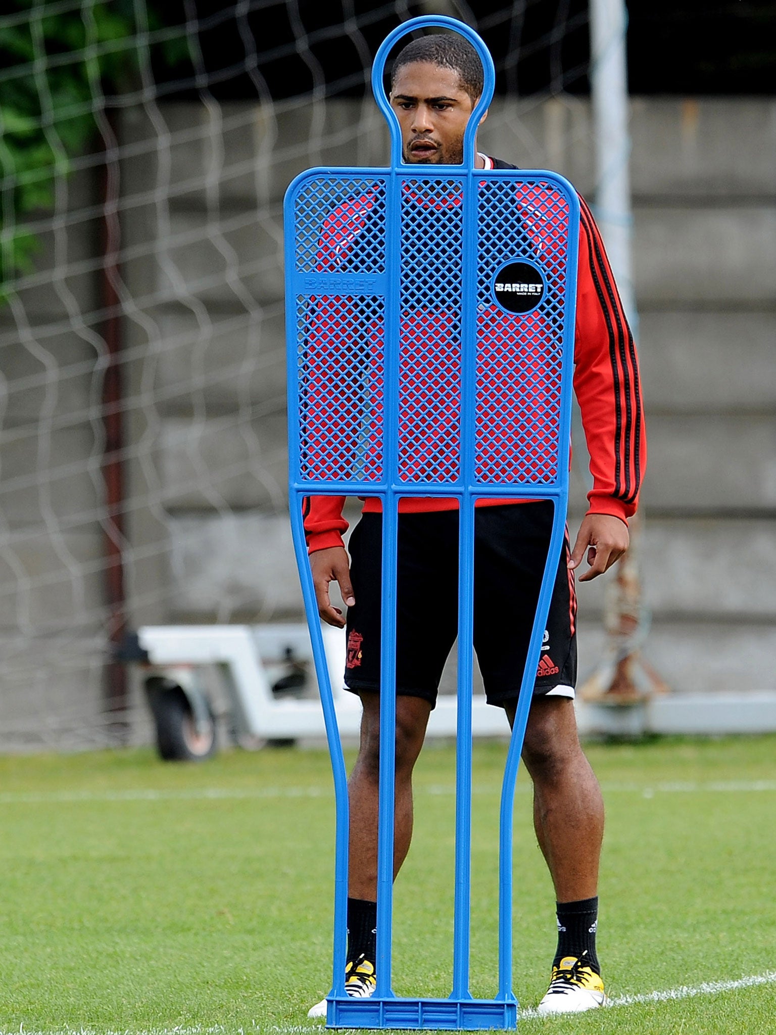 Glen Johnson keeps an eye on his man in training