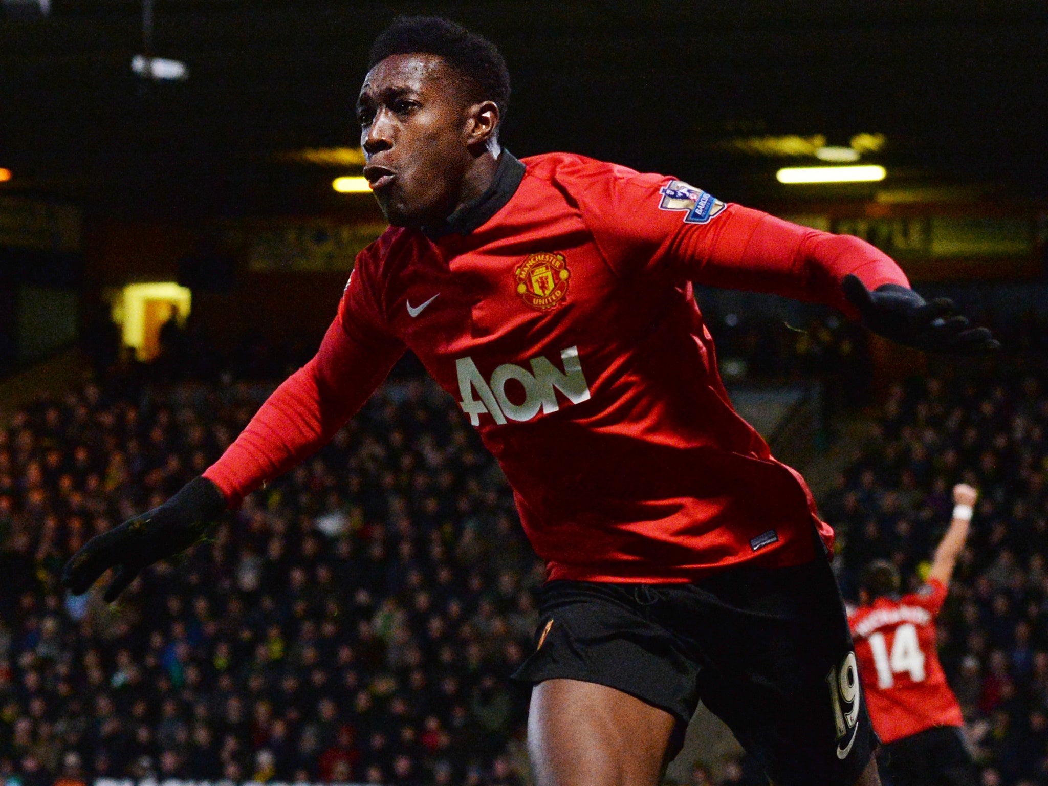 Manchester United forward Danny Welbeck celebrates after he scores against Norwich City