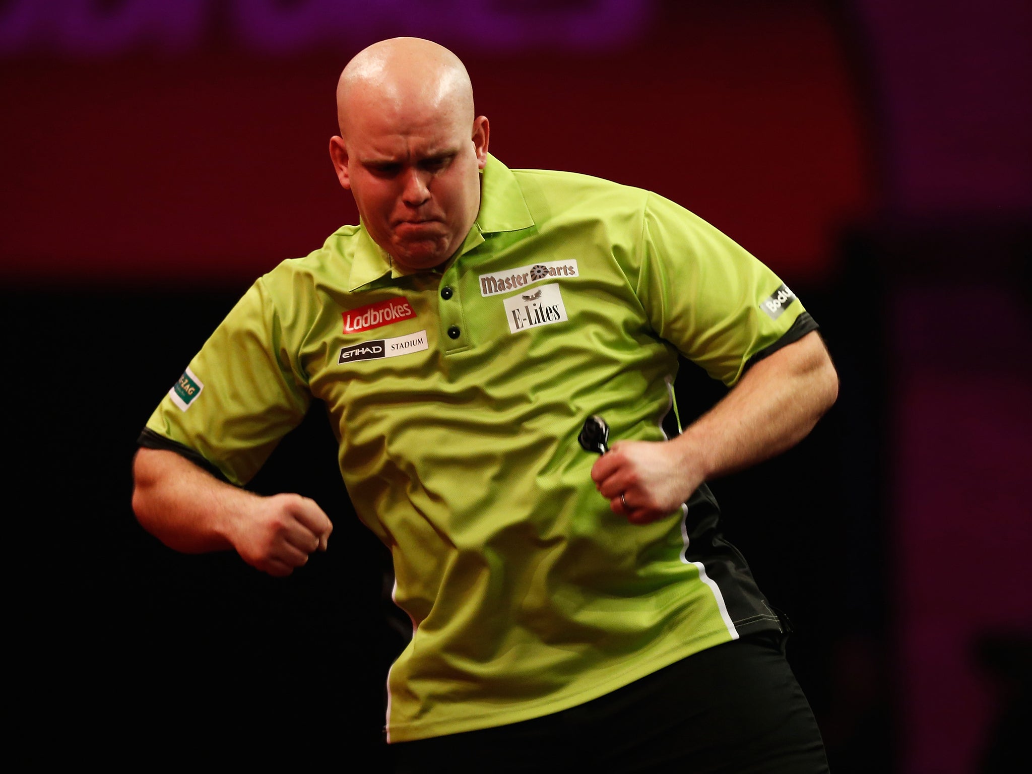 Michael van Gerwen celebrates during his third round victory over Gary Anderson