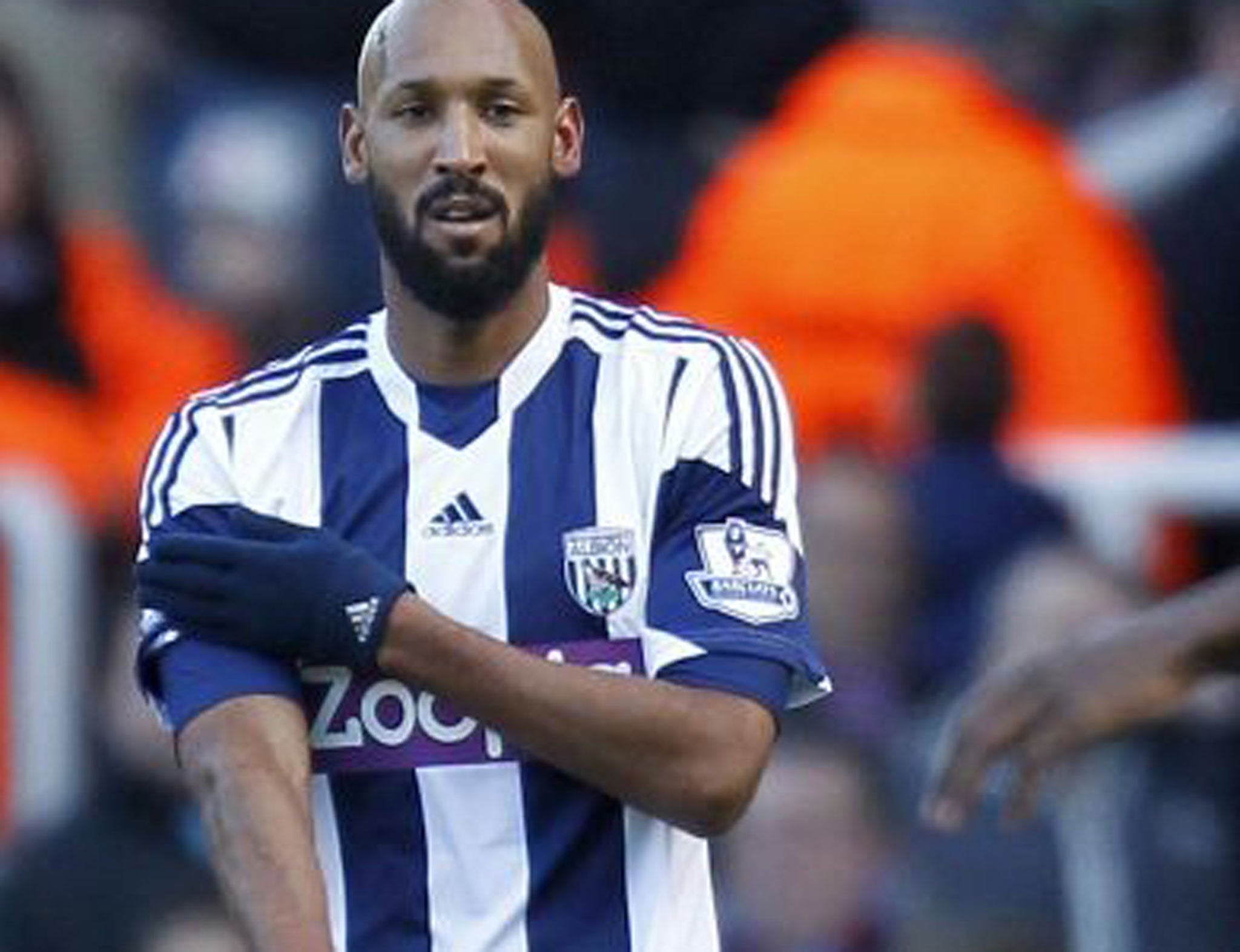 West Brom striker Nicolas Anelka makes an alleged anti-Semitic gesture when celebrating his first goal against West Ham