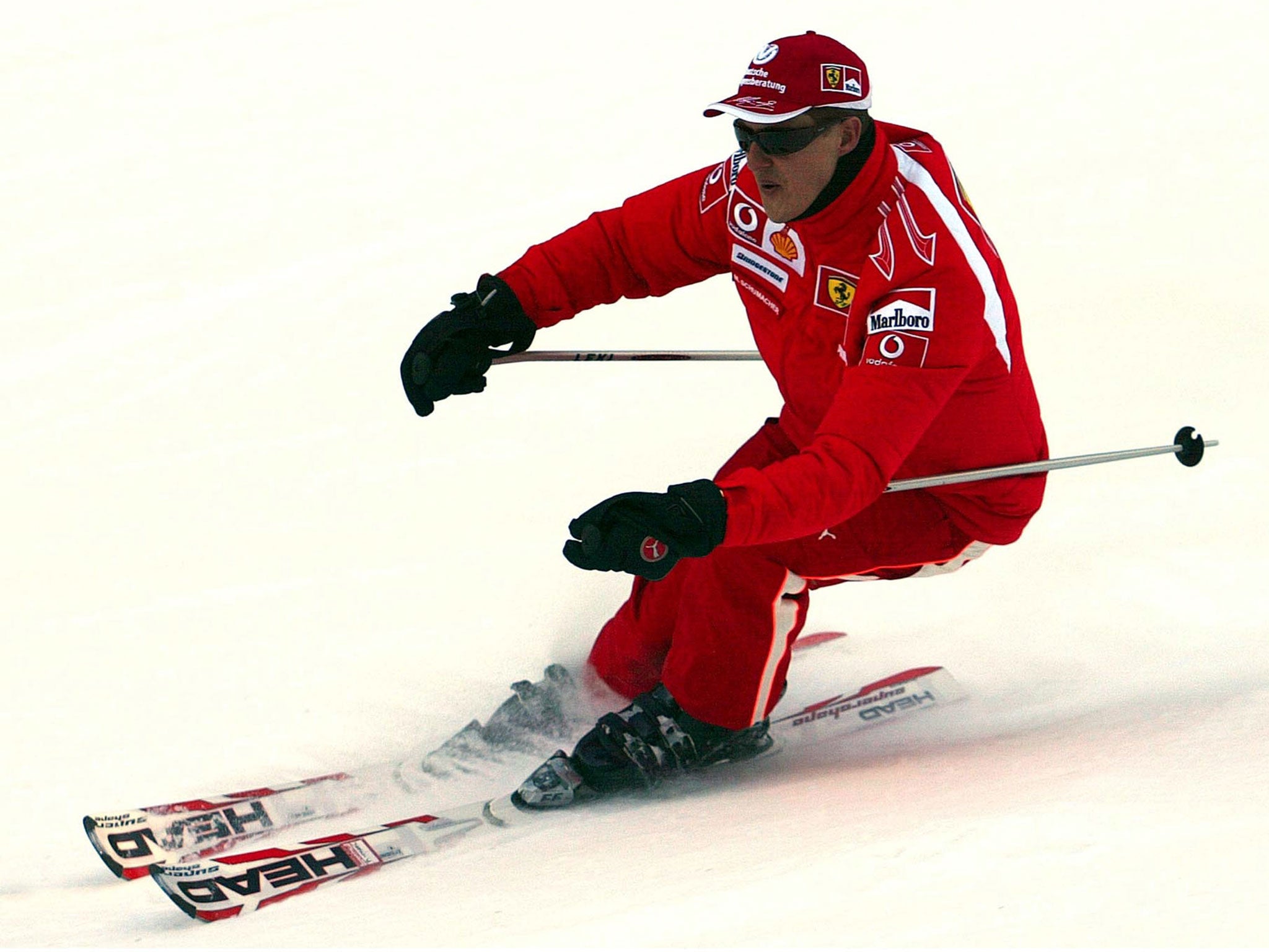 Michael Schumacher speeds down a course in the Madonna di Campiglio ski resort, in the Italian Alps in January 2006