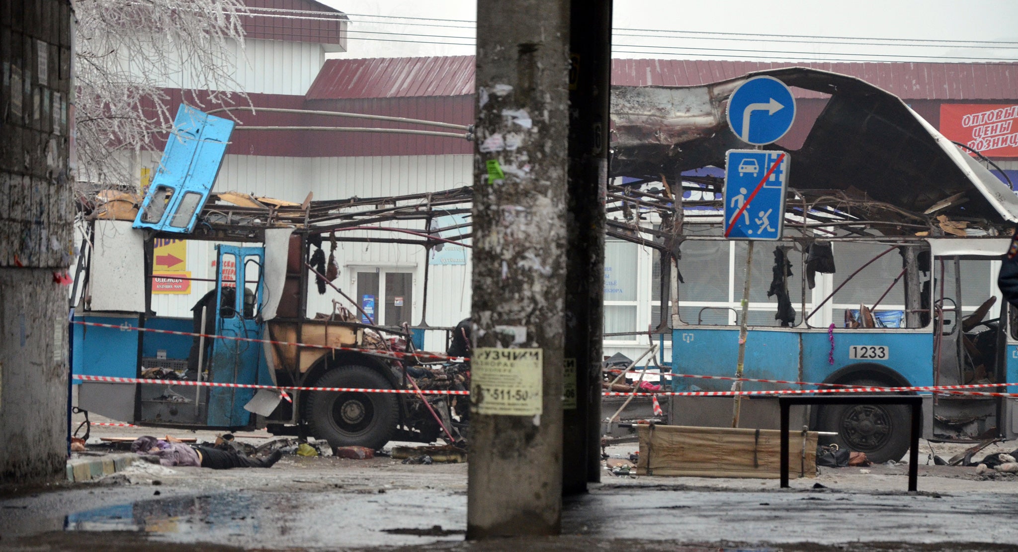 The destroyed trolleybus stands on a street in Volgograd after a bombing on the packed vehicle