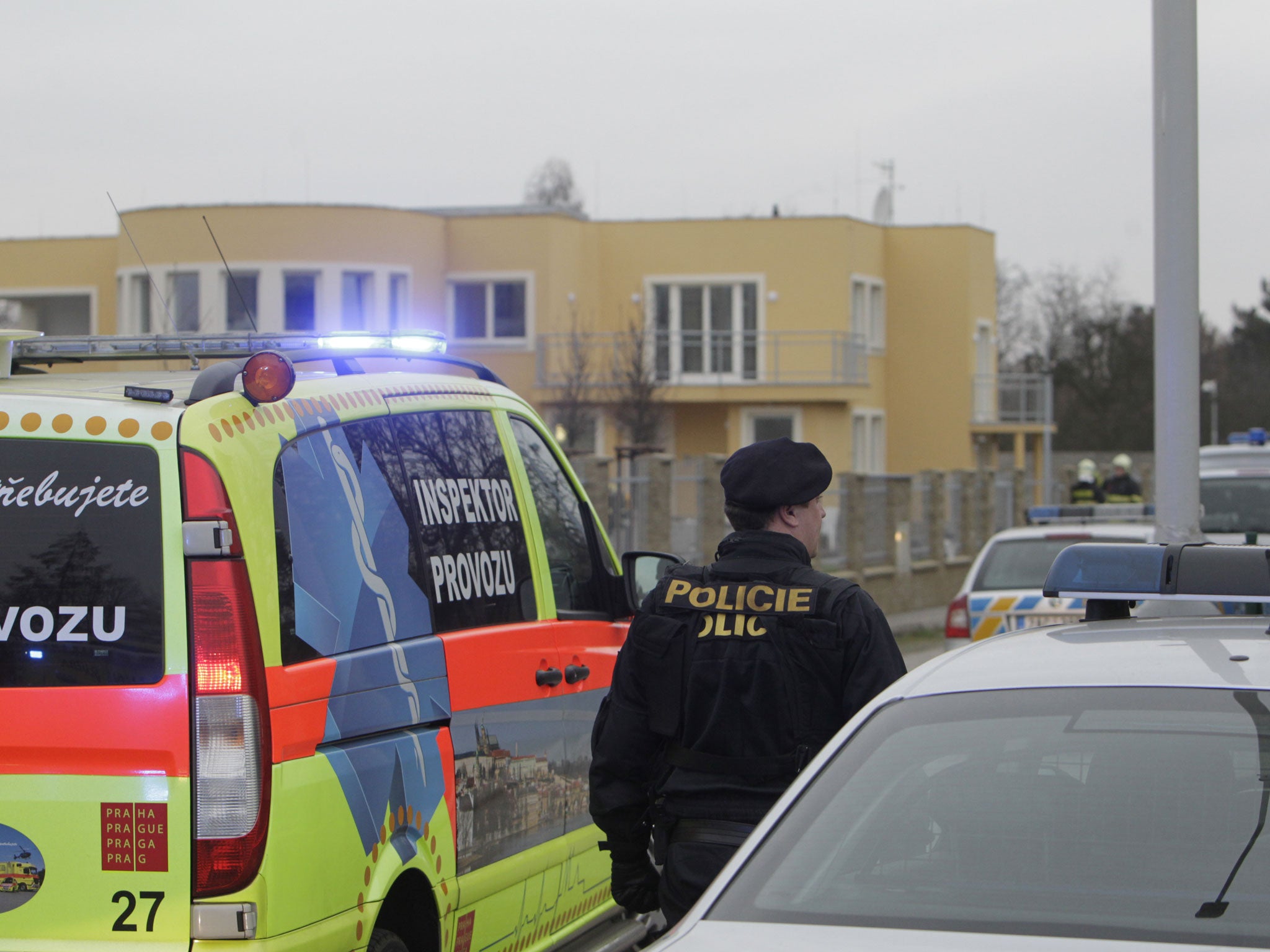 A policeman stands in front of the residence of Palestine ambassador, Jamal al-Jamal on January 1, 2014 in Prague