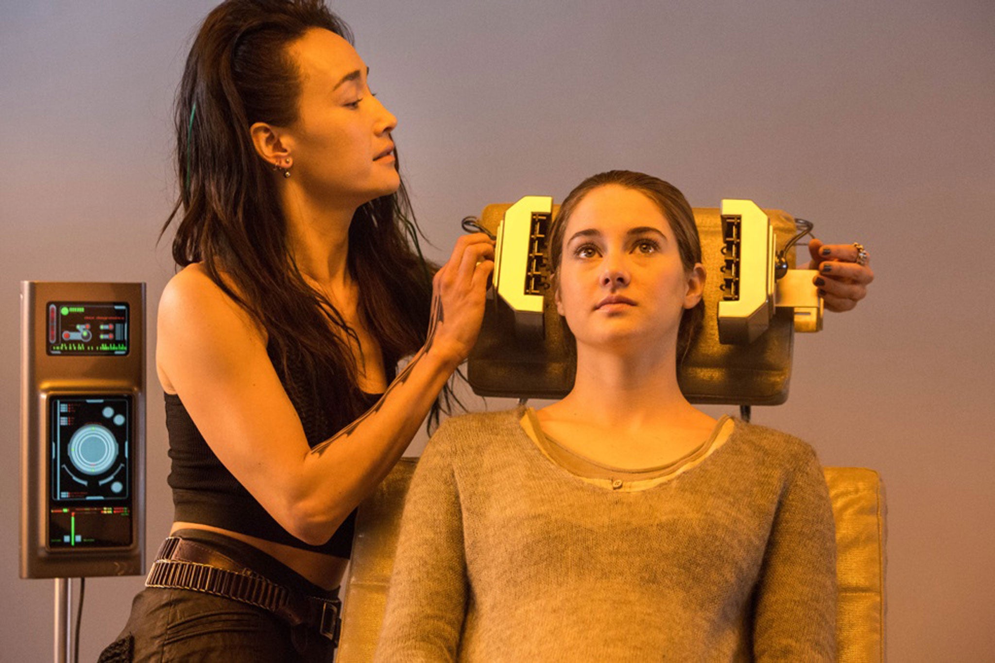 Shailene Woodley, who plays Tris, in 'Divergent', with Maggie Q