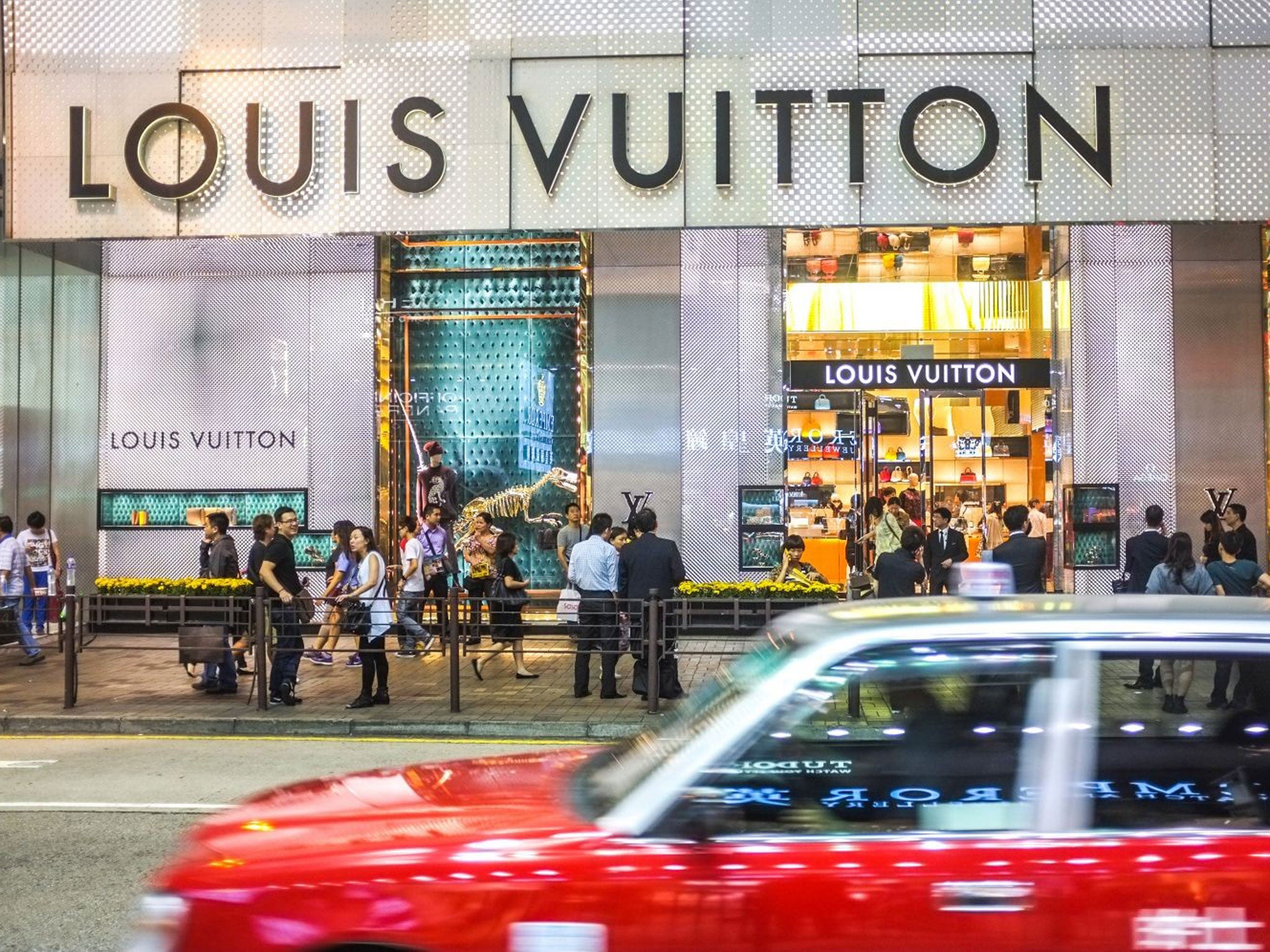 Attention to retail: Shoppers outside Louis Vuitton on Canton Road