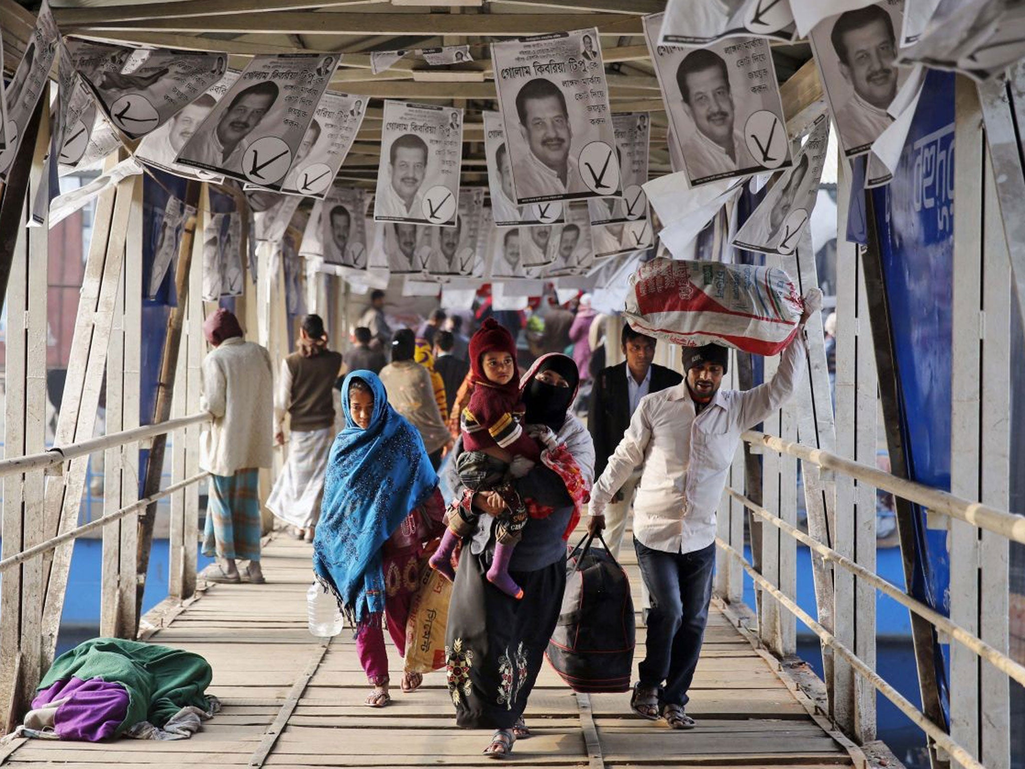 Election day: Dhaka’s ferry terminal was festooned with campaign leaflets