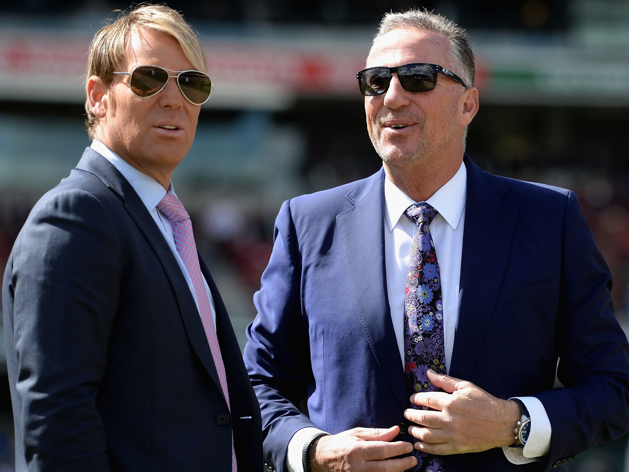 Ian Botham (left) watches with Australia great Shane Warne