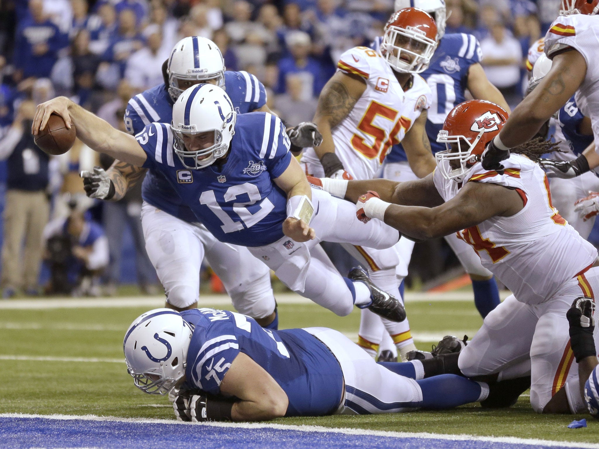 Indianapolis Colts quarterback Andrew Luck (12) dives for a touchdown