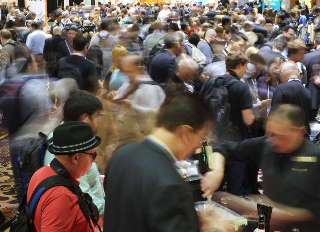 Journalists attend the first press event 'CES Unveiled' in Las Vegas.