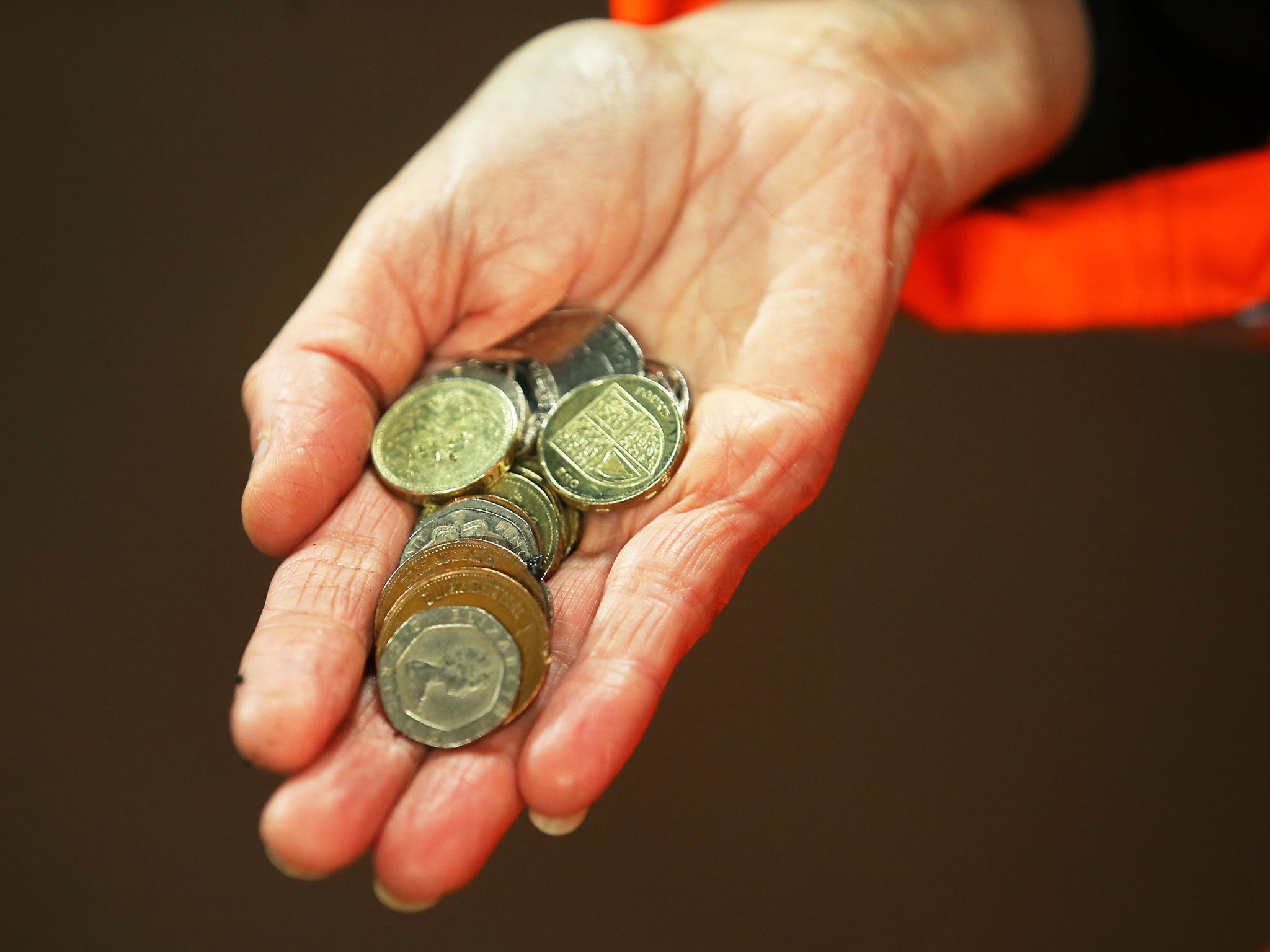 Got any change? A steward collects the coins thrown at Walcott