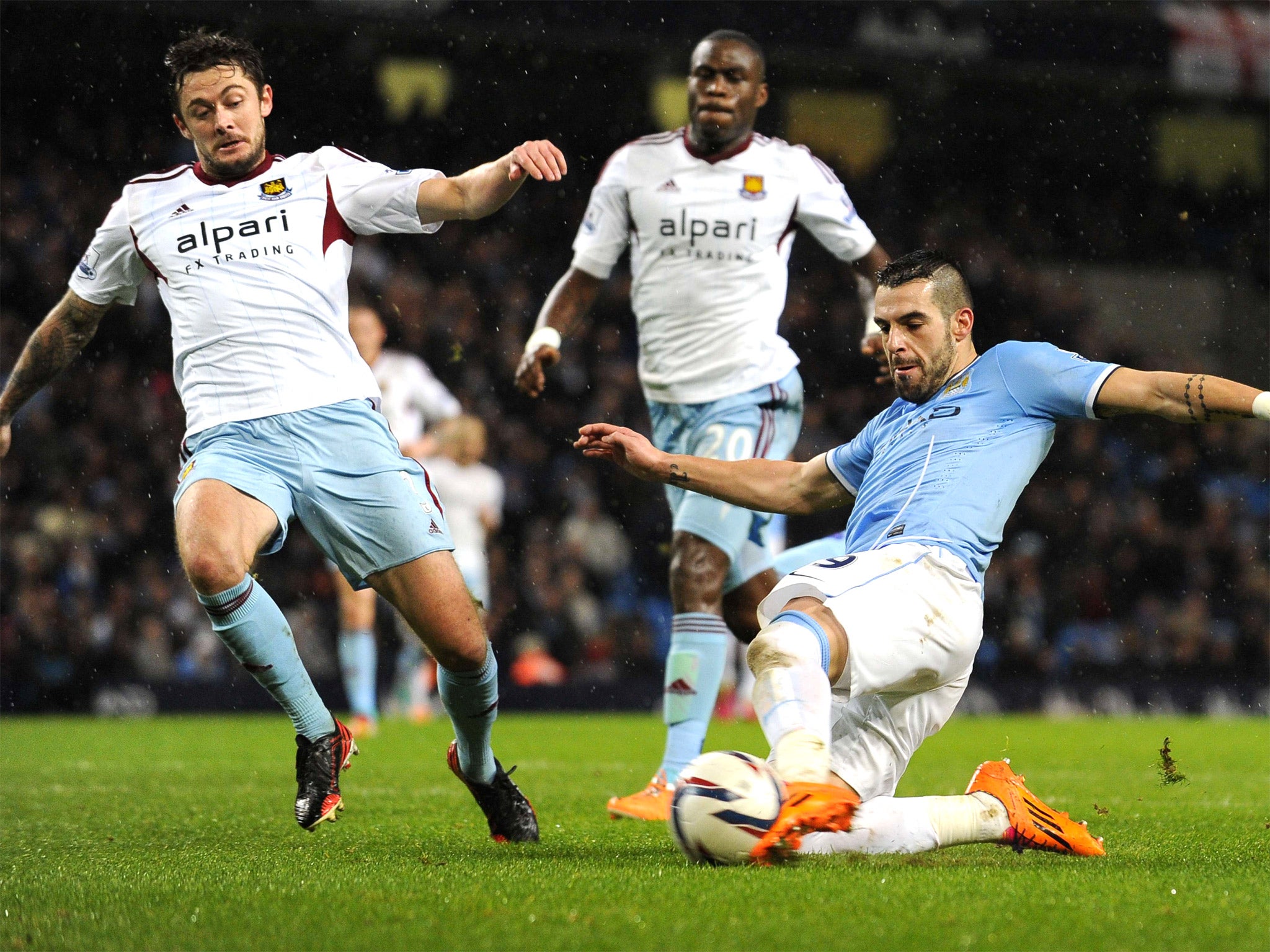 Alvaro Negredo slides in to score his second goal