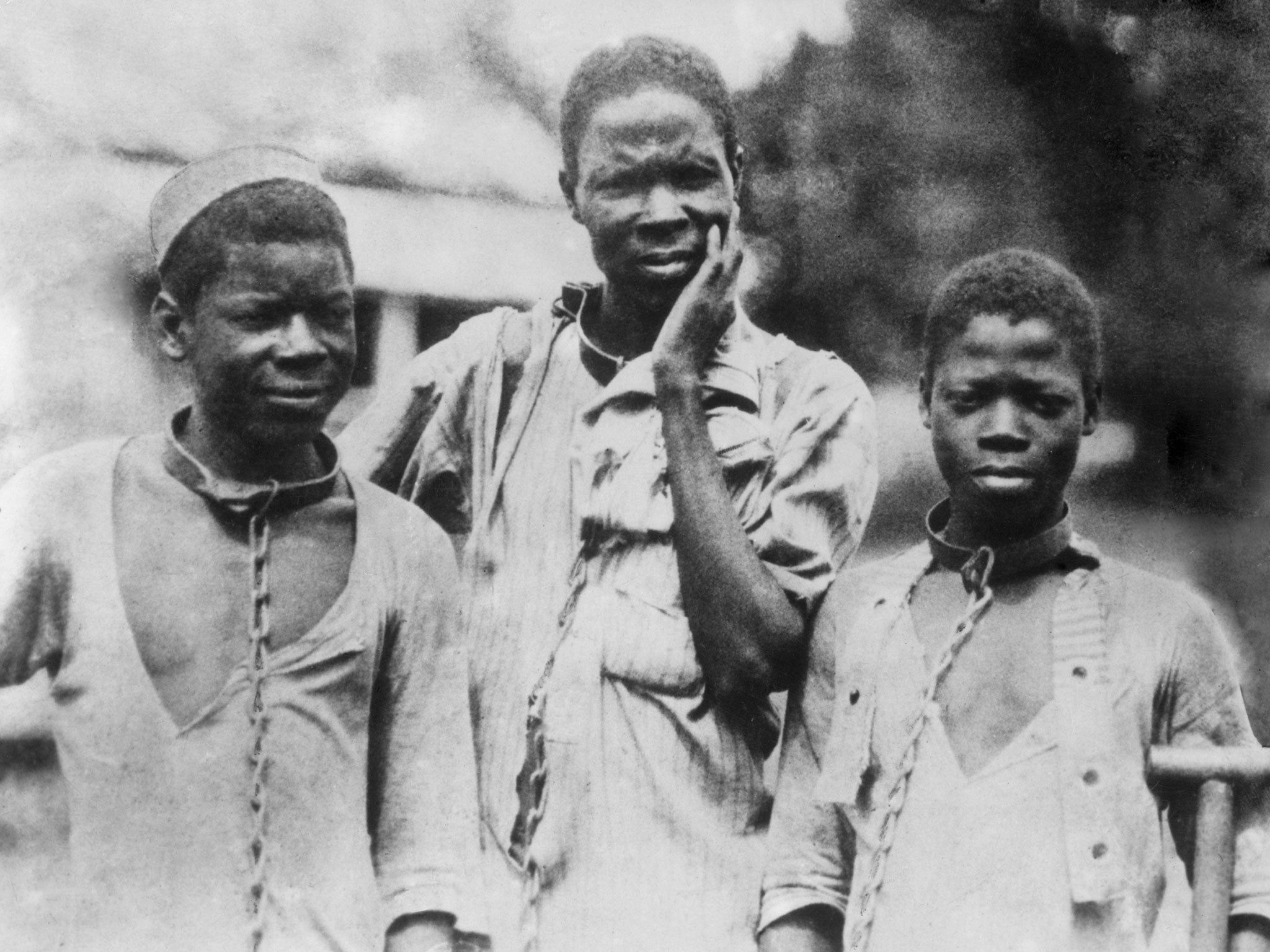 Chain reaction: Abyssinian slaves forced to wear iron collars, photographed around 1910