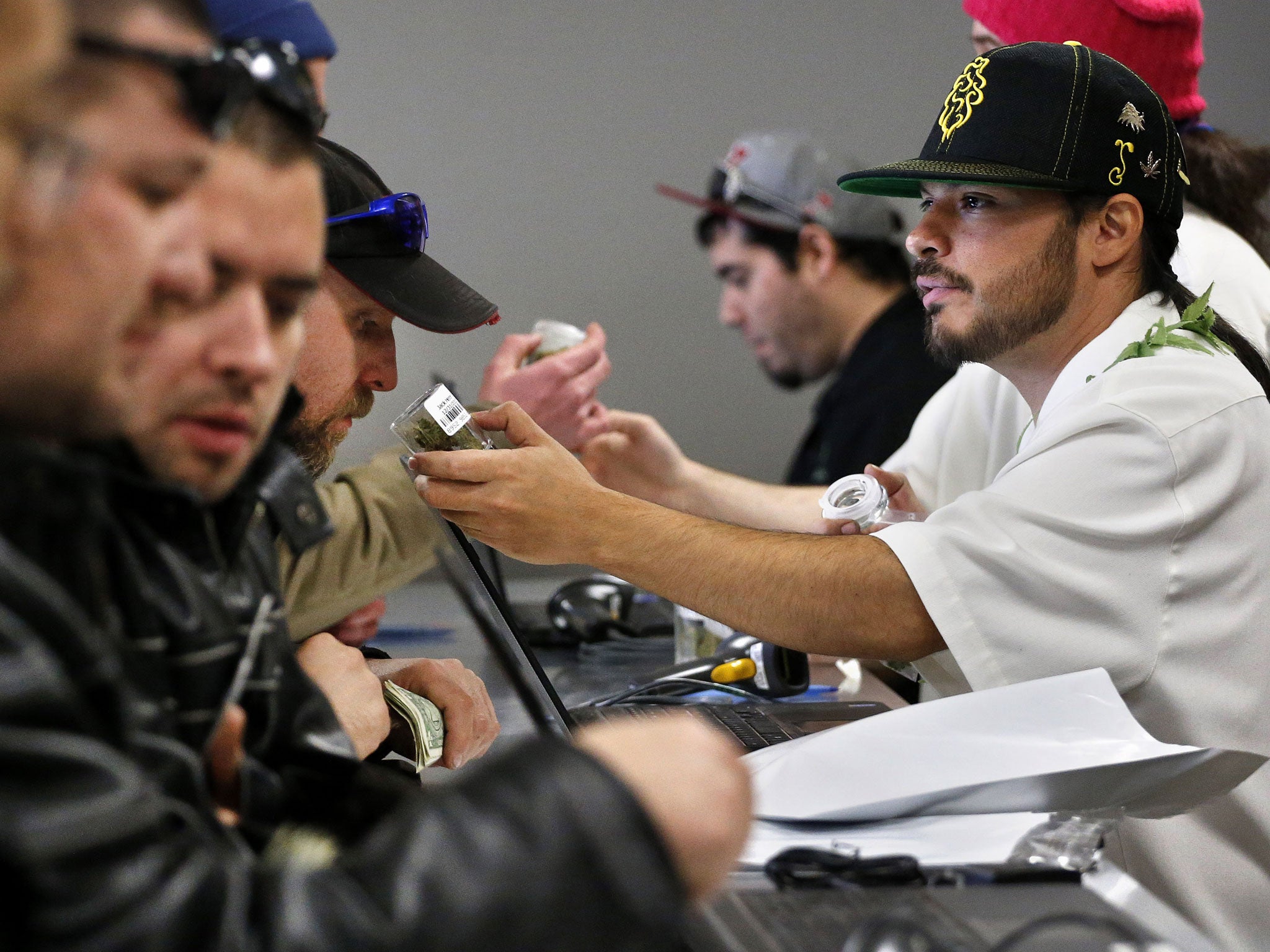 A crowded sales counter at a marijuana retailer in Denver