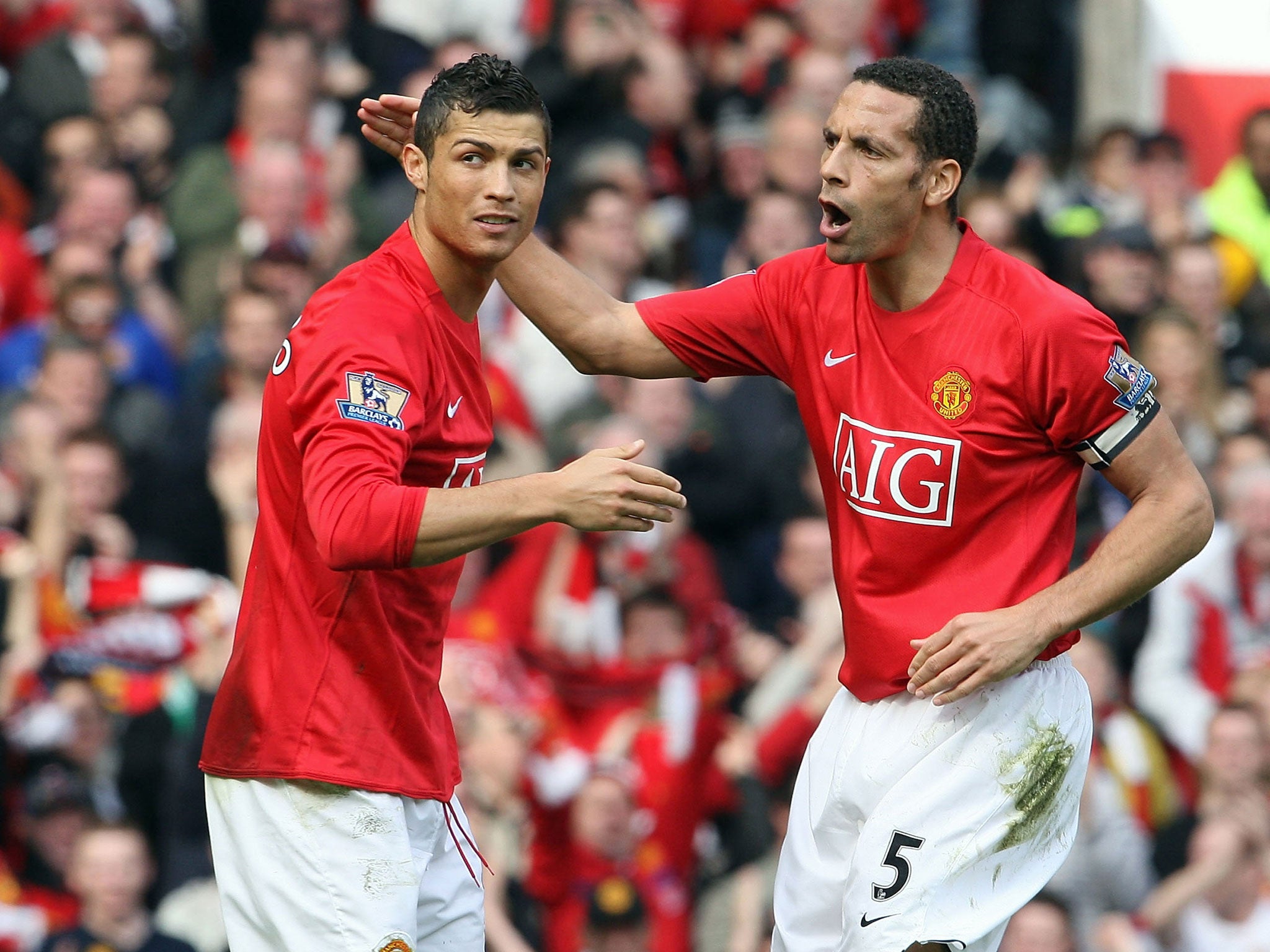 Rio Ferdinand (R) has admitted that he tried to persuade Cristiano Ronaldo (L) to return to Manchester United last summer