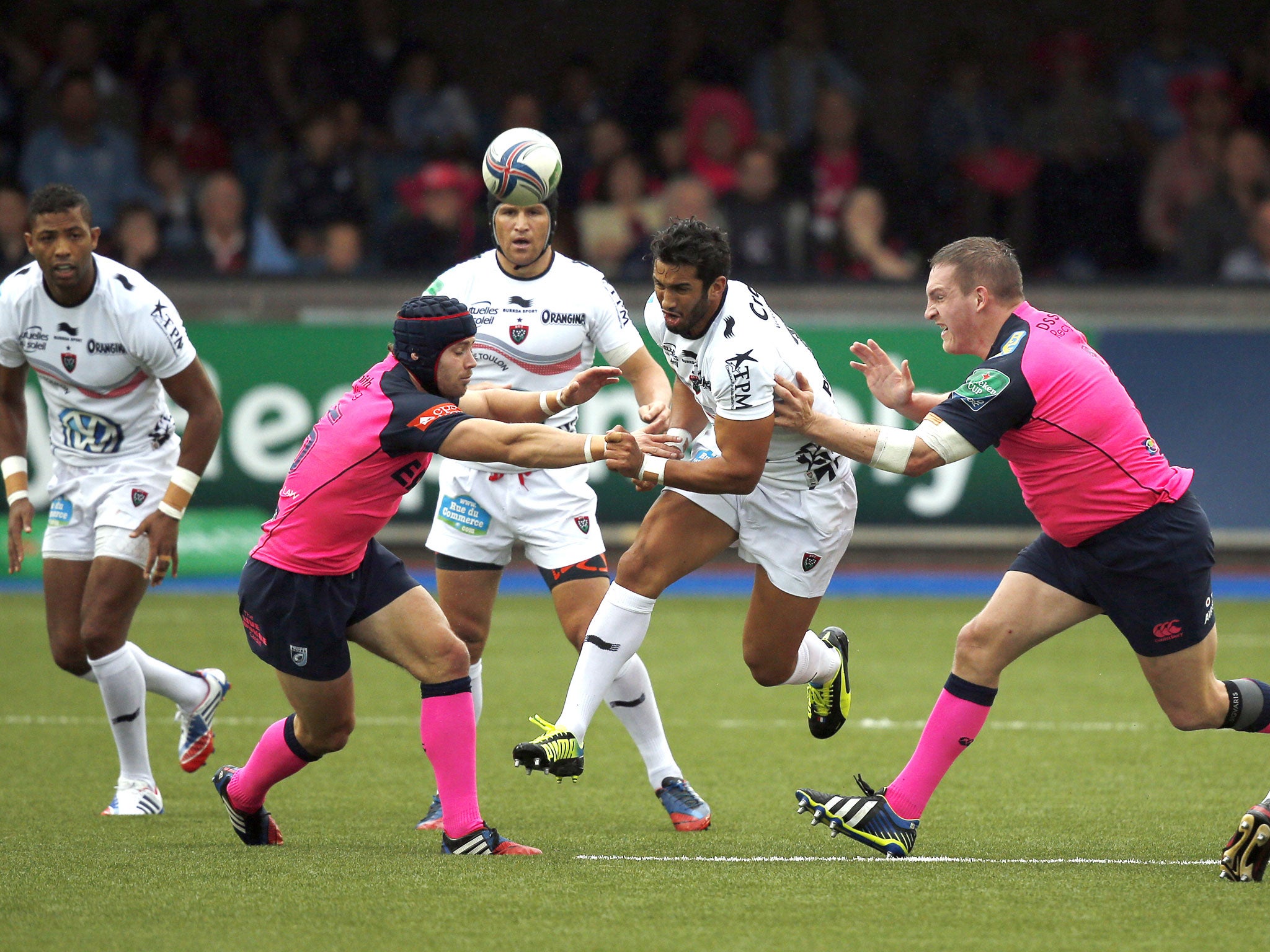 Toulon centre Maxime Mermoz attempts to break through the Cardiff defence