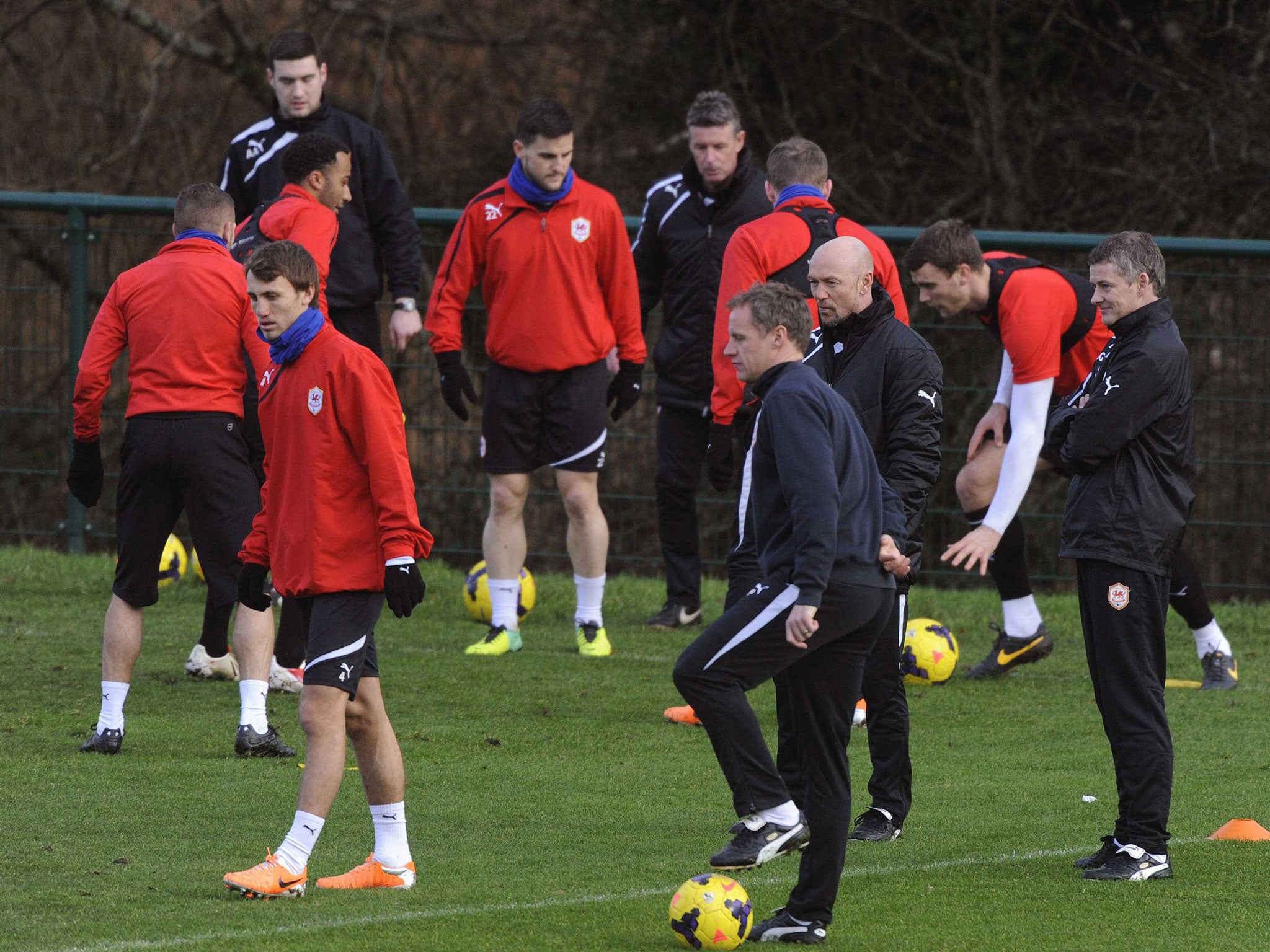 Ole Gunnar Solskjaer, right, takes training with Cardiff (Reuters)