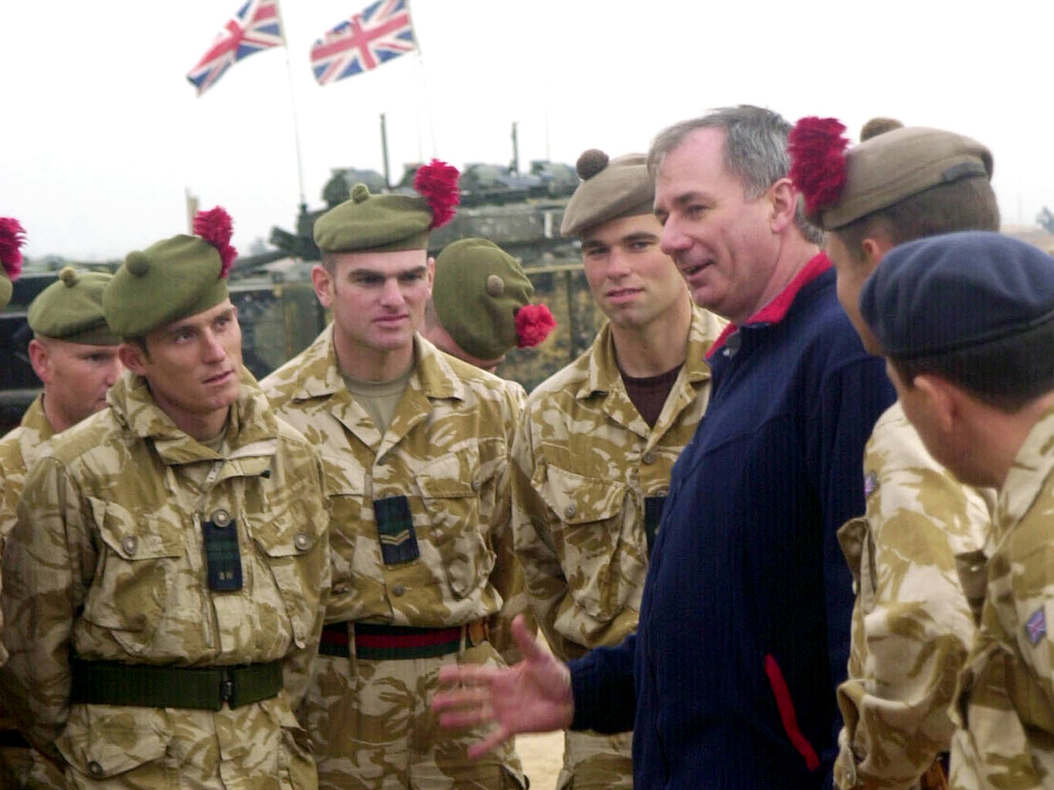 Geoff Hoon at the Basra base camp, Iraq in December 2004. The former Defence Secretary has been named in a dossier alleging widespread abuse of Iraqi prisoners by British soldiers which could see some of Britain's leading defence figures facing prosecution for "systematic" war crimes (Reuters)