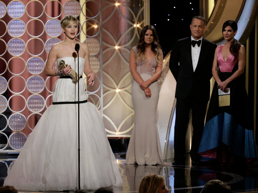 Jennifer Lawrence accepts the award for Best Supporting Actress in a Motion Picture for 'American Hustle' during the 71st Annual Golden Globe Award at The Beverly Hilton Hotel on January 12, 2014 in Beverly Hills, California.