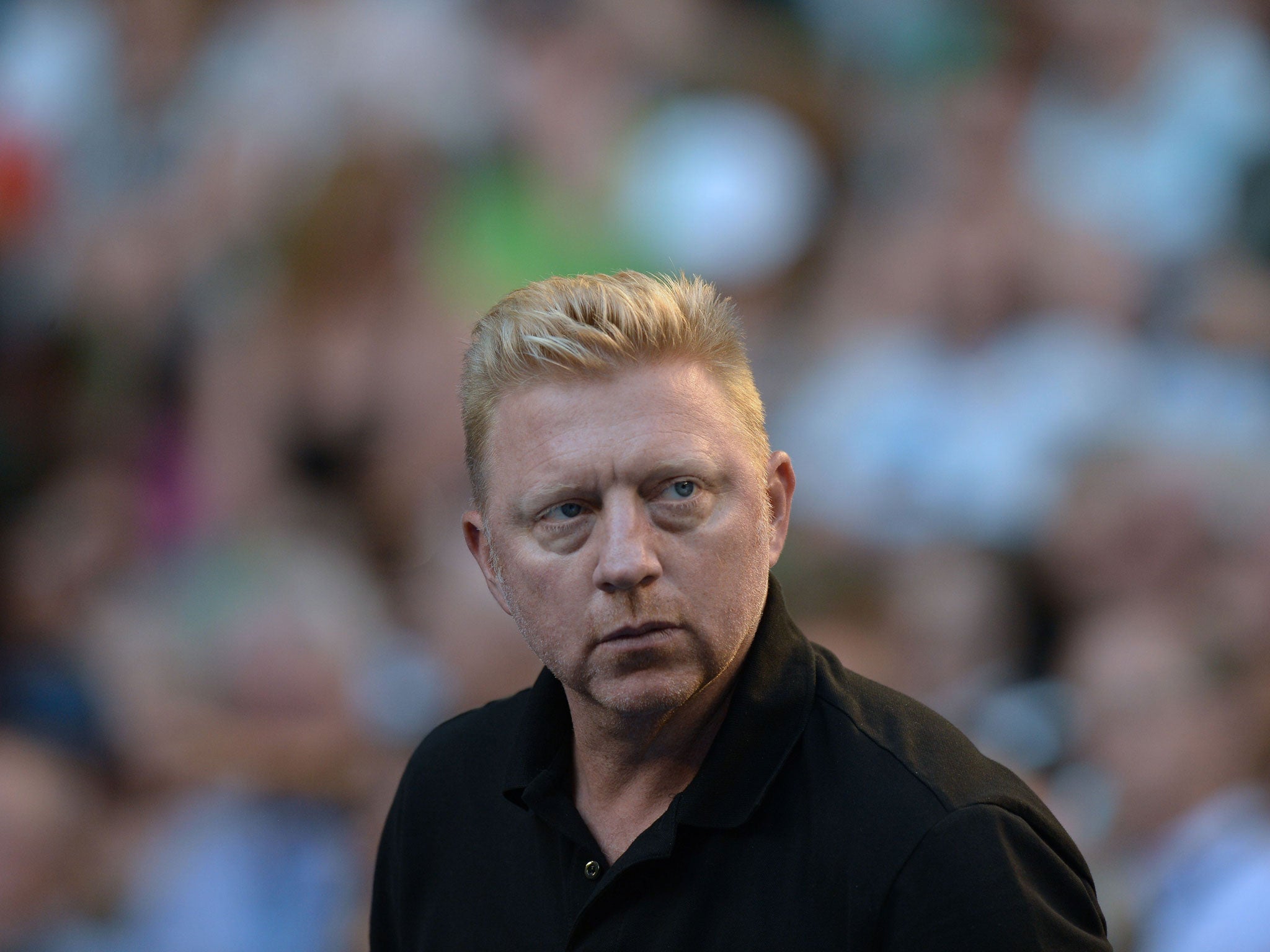 Boris Becker saw Novak Djokovic complete a routine first-round win in Melbourne on Monday