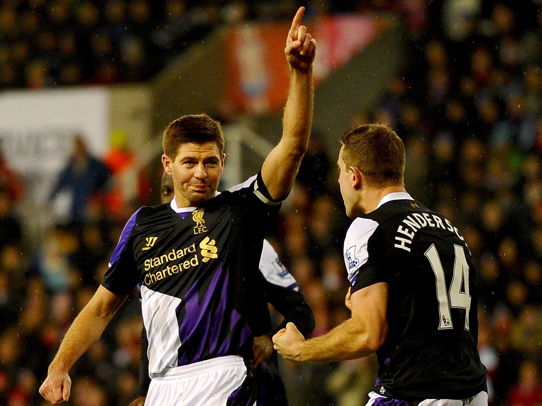 Steven Gerrard, left, impressed just in front of the back four