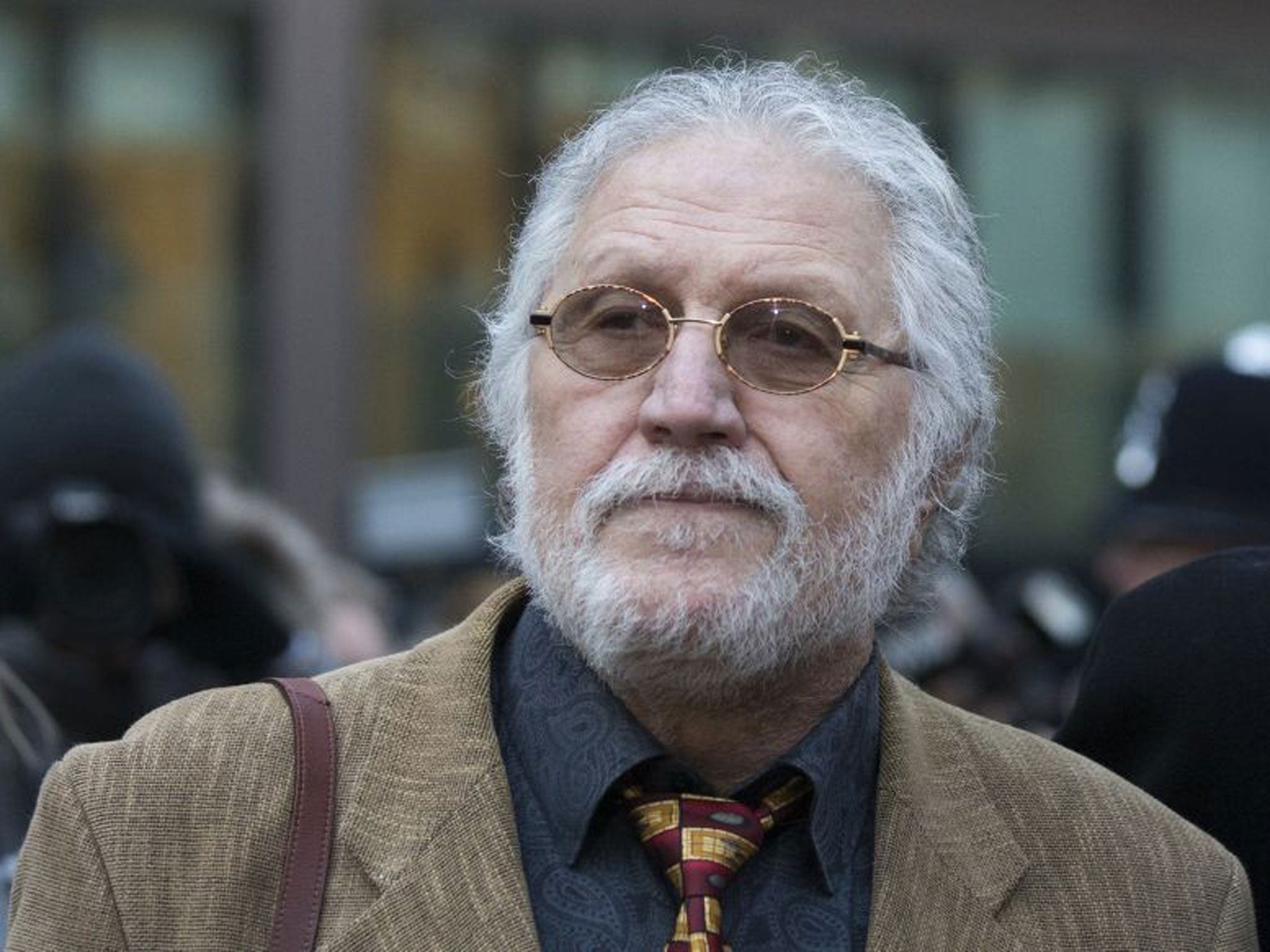 Radio DJ Dave Lee Travis arrives at Southwark Crown Court on 14 January, 2014