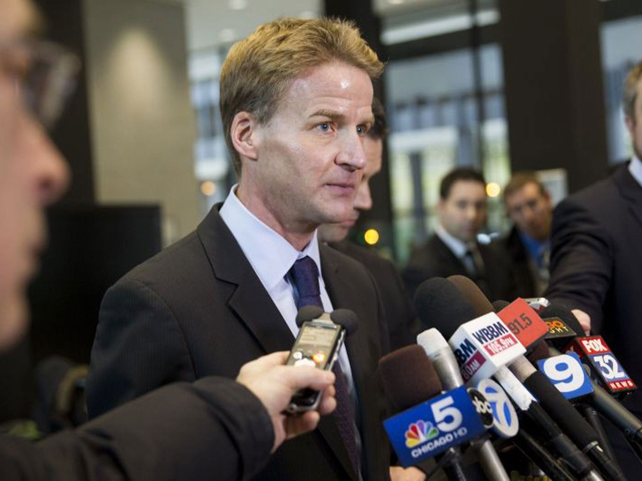 US Attorney Zachary Fardon speaks to reporters outside the court. He said the sentence 'is less than we asked for but is not nothing'