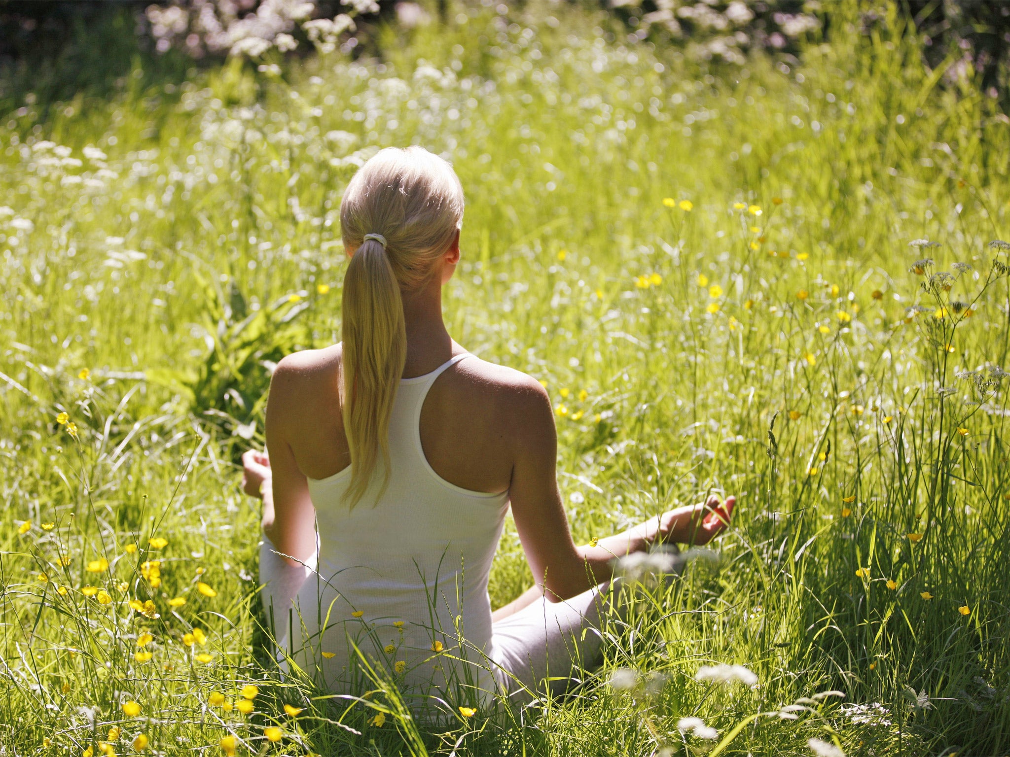 On reflection: a woman meditates the traditional way