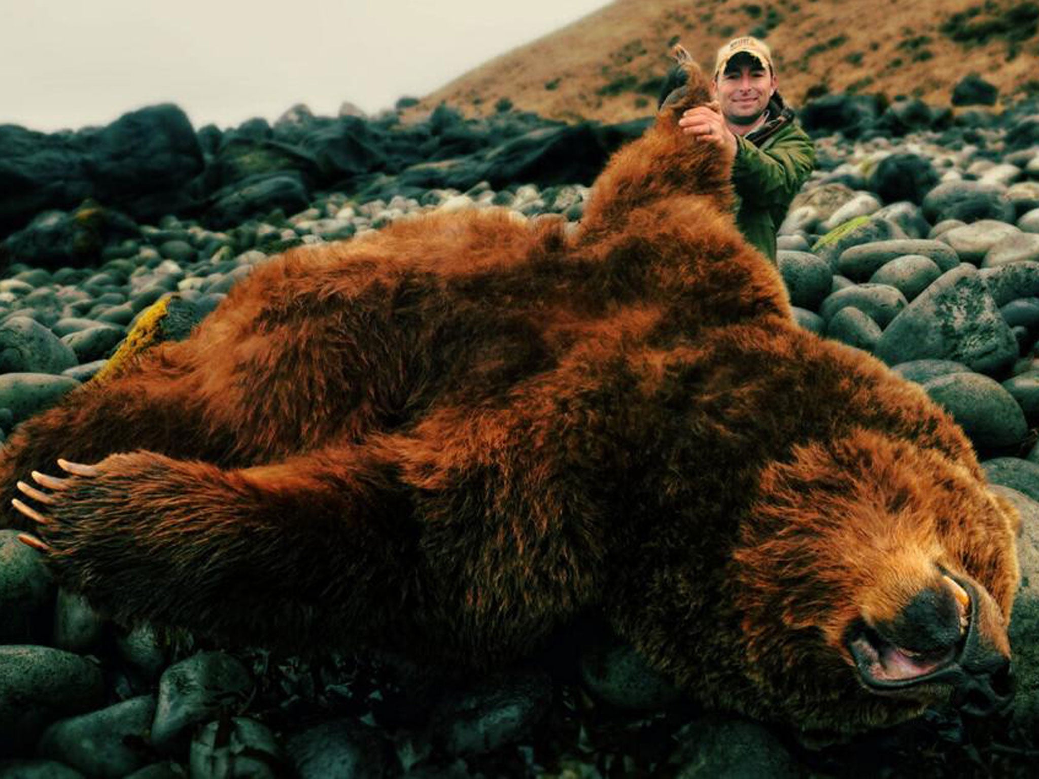 Corey Knowlton has been identified as the man who placed the winning bid at the Dallas Safari Club. He posted this picture with the caption: "Brown Bear, an awesome dream that came true for me."