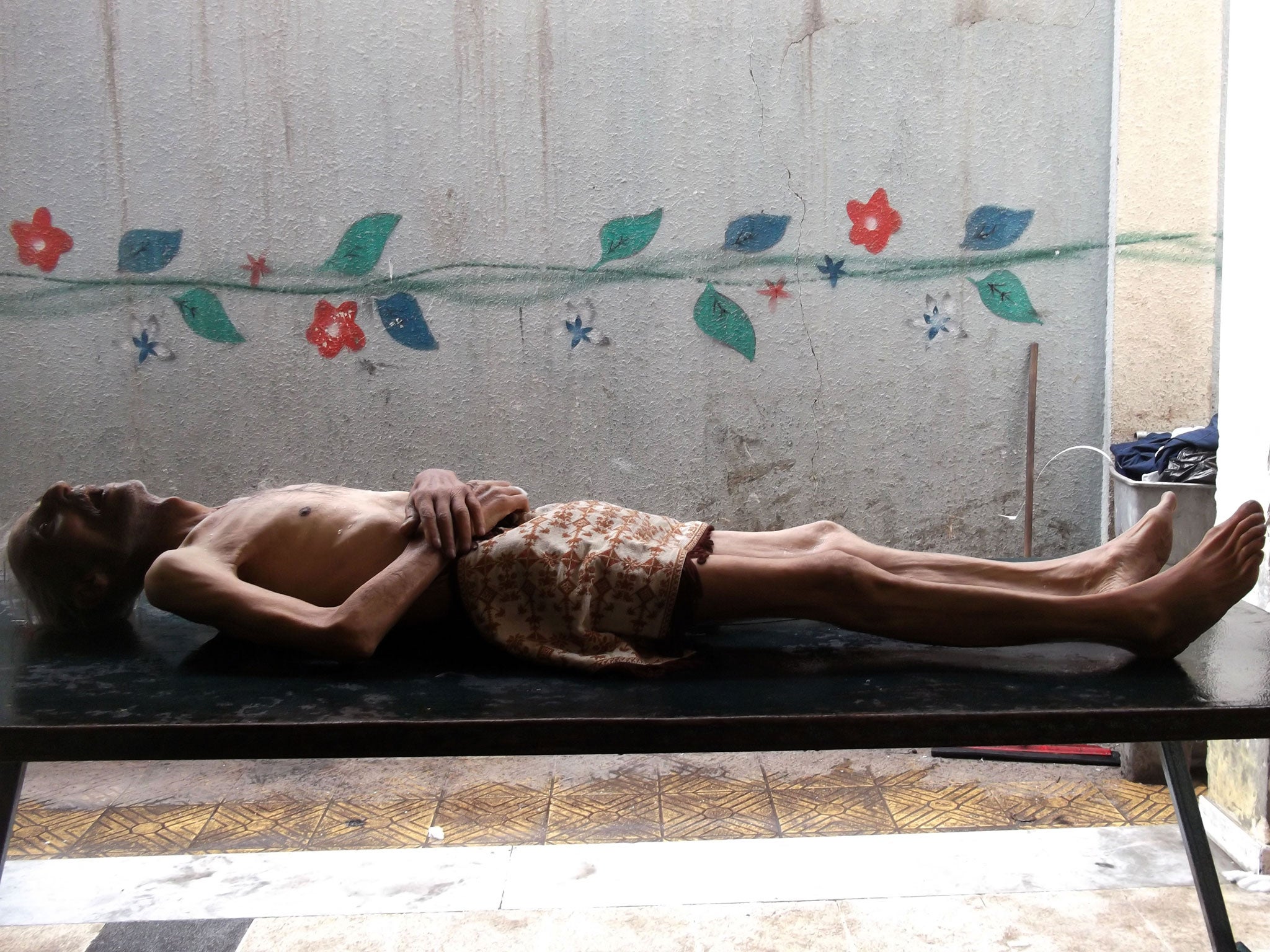 The emaciated body of Awad al-Saidi, who, according to locals, died of hunger and sickness there