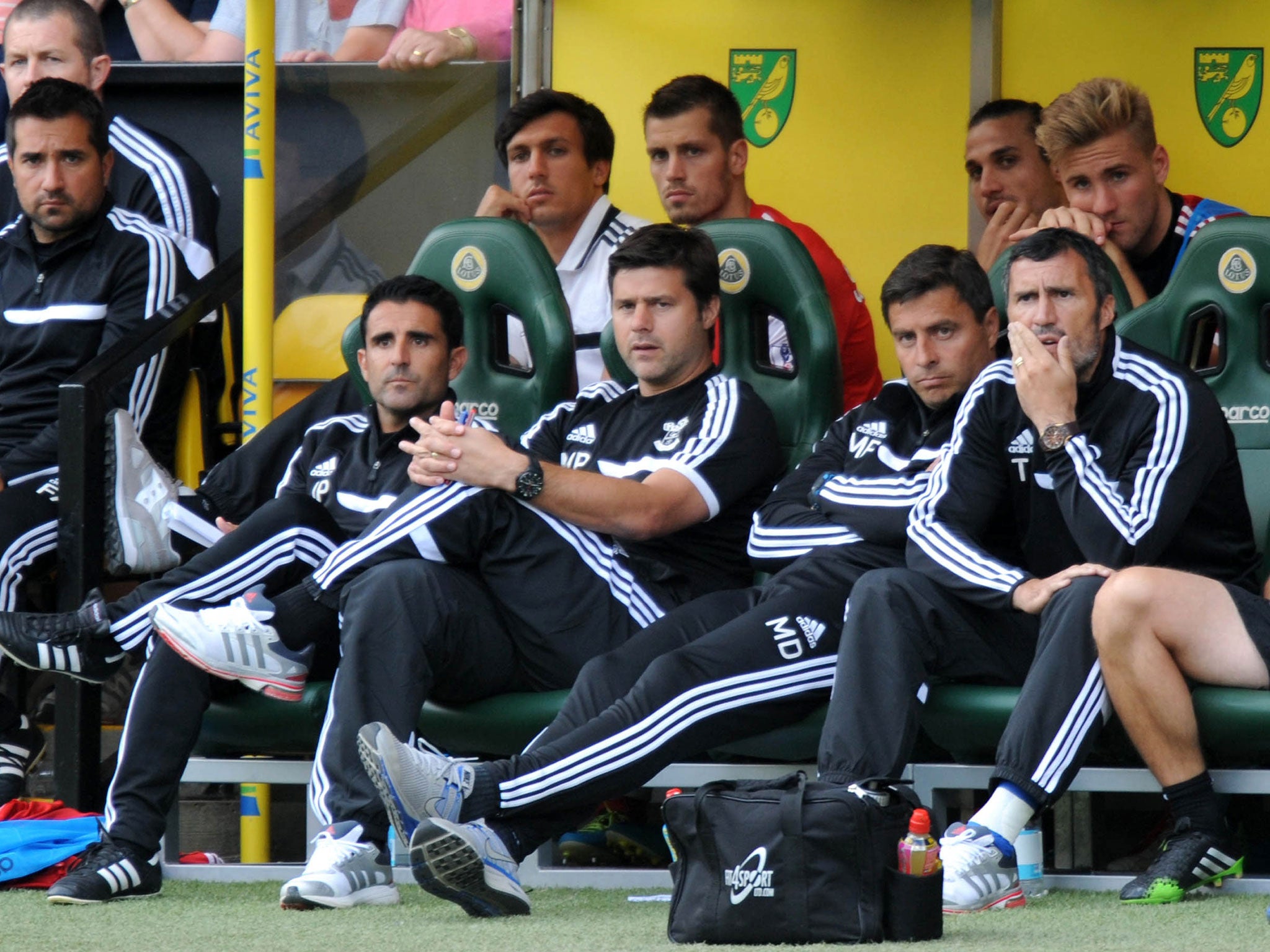 Mauricio Pochettino (second left) will be at Sunderland on Saturday