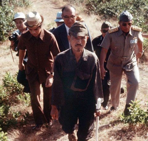 Hiroo Onoda emerges from the jungle on Lubang island in the Philippines on 11 March 1974