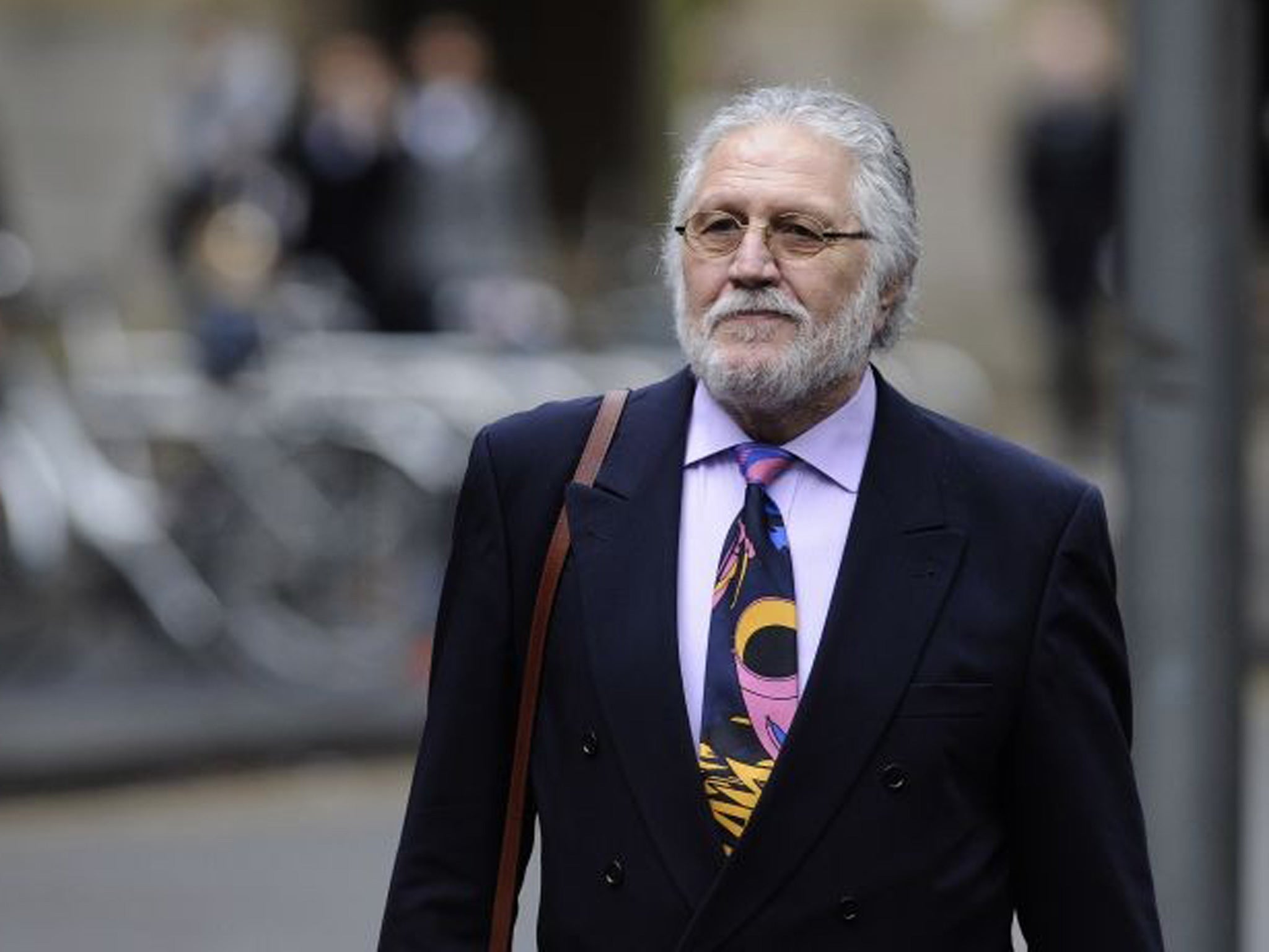 Dave Lee Travis, whose real name is David Patrick Griffin, arrives at Southwark Crown Court, pictured on 17 January.